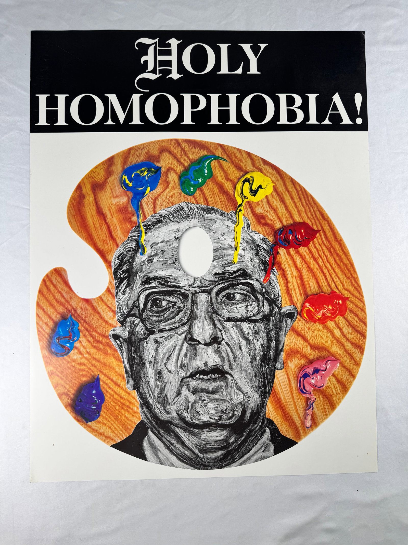 Robbie Conal Holy Homophobia Contemporary Graphic Poster: Contemporary poster titled Holy Homophobia featuring painted portrait imagery and palette motif.