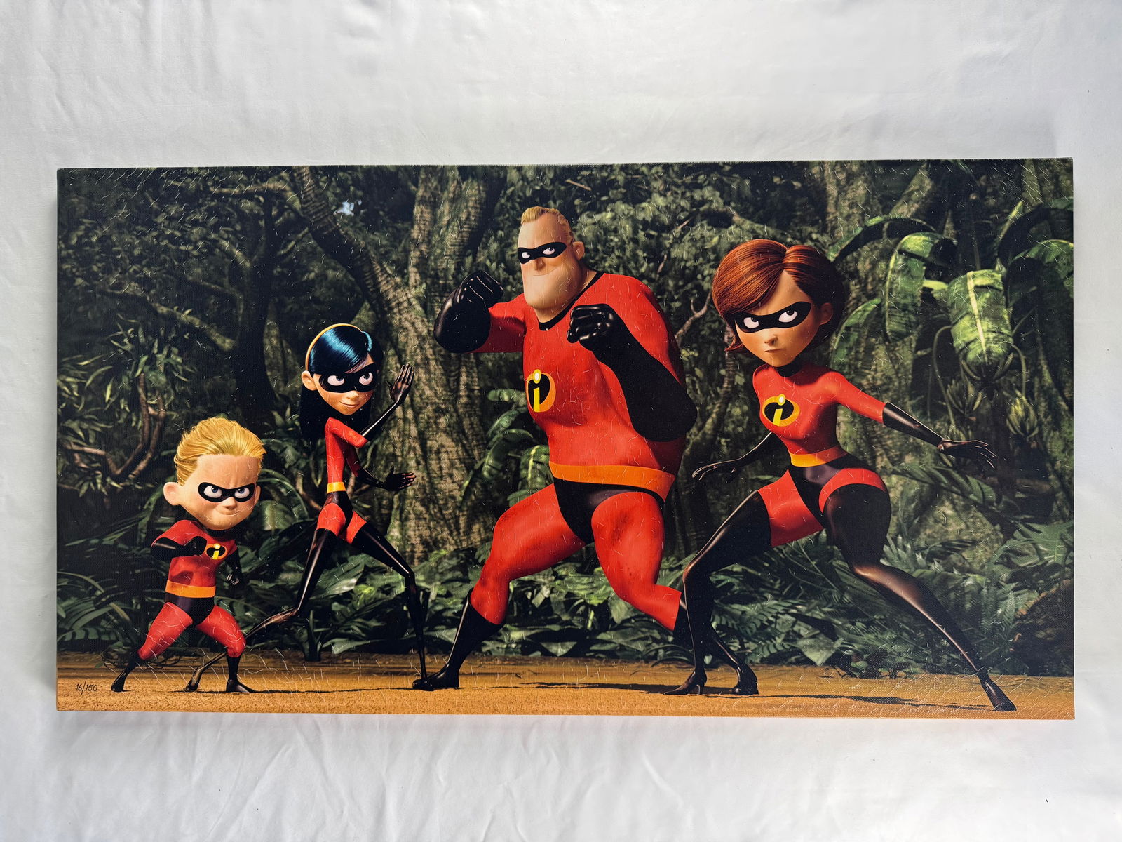 The Incredibles Limited Edition Art Giclee Print with COA (2004): Limited edition art print from the animated film The Incredibles released in 2004. The film stars Craig T. Nelson, Holly Hunter, and Samuel L. Jackson.