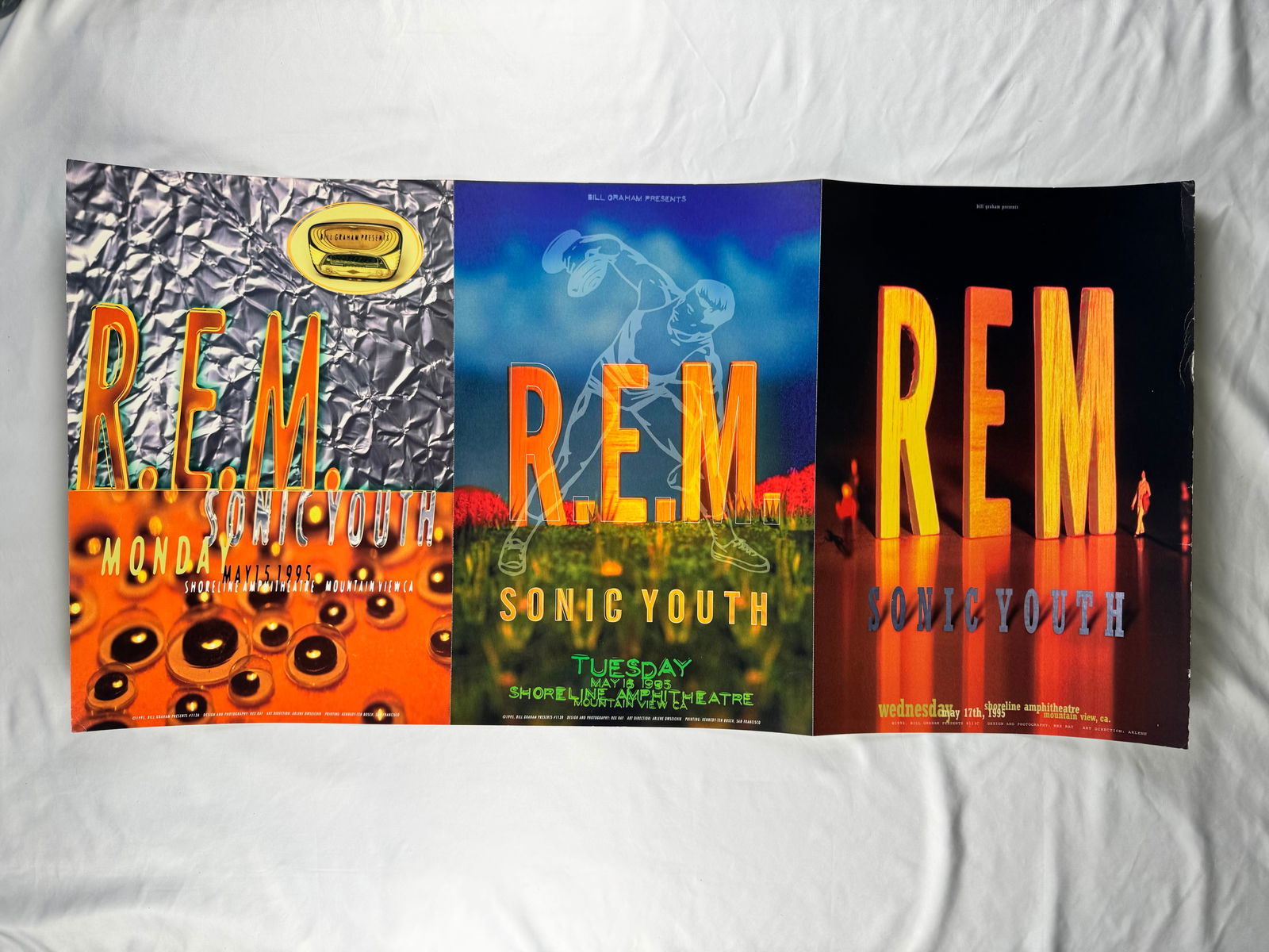 R.E.M. Sonic Youth Shoreline Amphitheatre Concert Poster 1995: Concert poster for R.E.M. with Sonic Youth at Shoreline Amphitheatre, Mountain View, California. Dated May 1995.