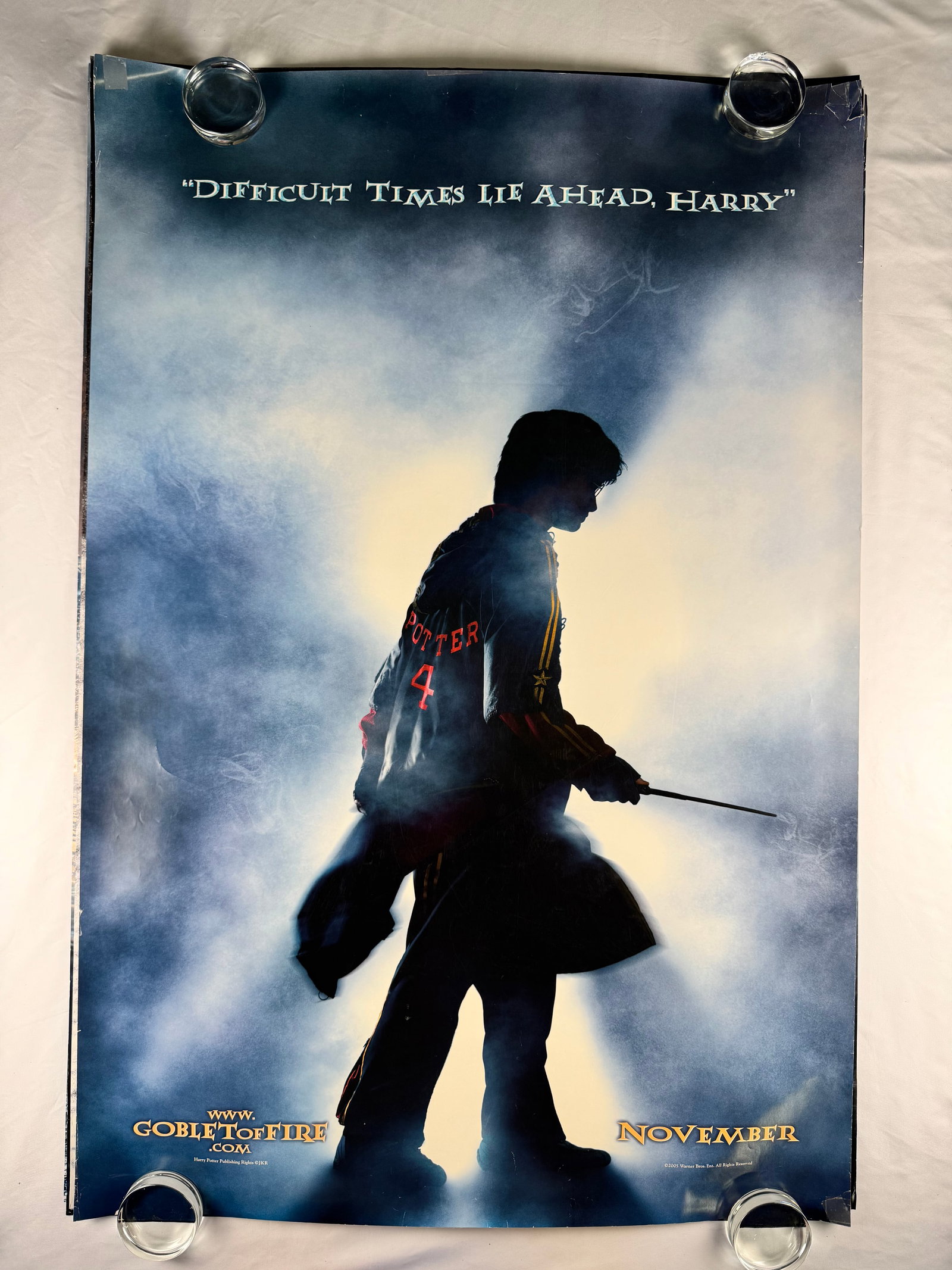 Harry Potter and the Goblet of Fire Silhouette Original One Sheet Movie Poster 27"x40" 2005: Original theatrical silhouette style movie poster for Harry Potter and the Goblet of Fire released in 2005 starring Daniel Radcliffe, Emma Watson, and Rupert Grint. Fantasy adventure film produced by