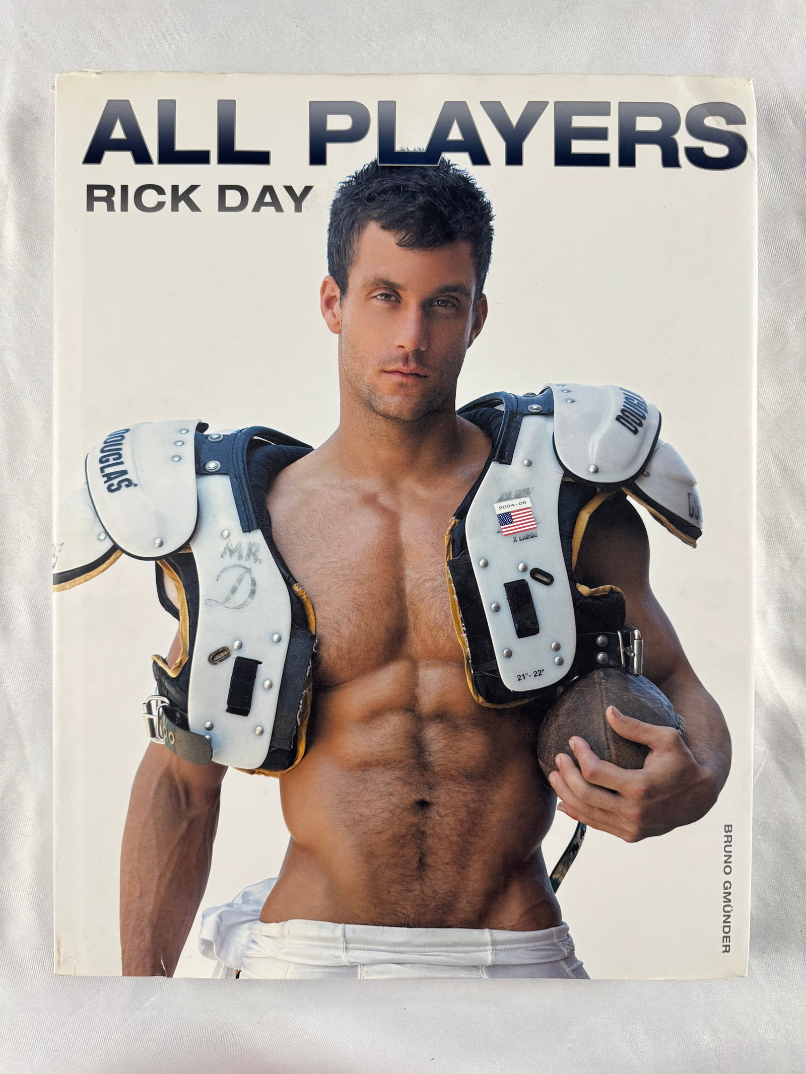 All Players Rick Day Photo Book Bruno Gmünder - Gay Interest Nude Male Photography: A hardcover photography book titled "All Players" by Rick Day, published by Bruno Gmunder. The book features color photographs of male models, including nude and semi-nude athletic portrait studies th