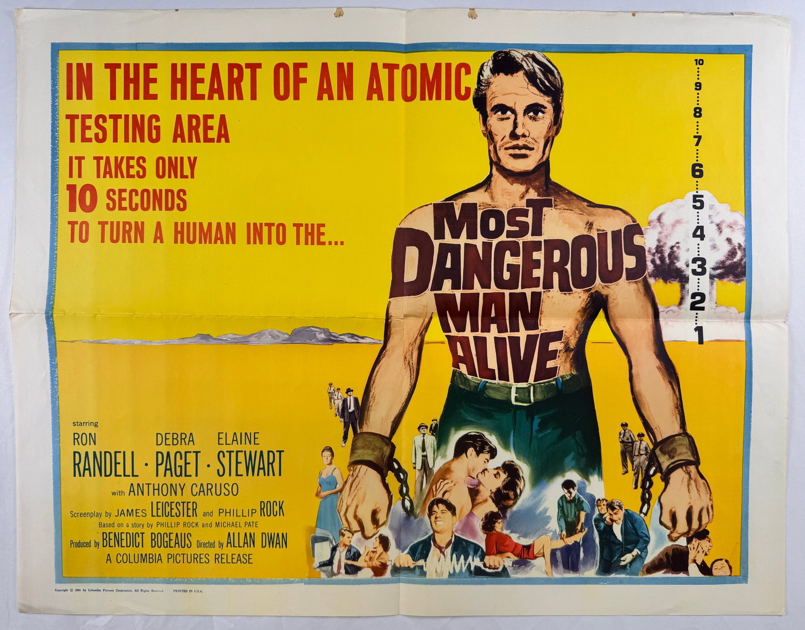 Most Dangerous Man Alive (1961) Original Atomic Age Half Sheet Movie Poster 28x22 Allan Dwan Ron: Most Dangerous Man Alive is a 1961 science fiction crime film directed by Allan Dwan and starring Ron Randell, Debra Paget, and Elaine Stewart. This half sheet poster measures approximately 28 x 22 in