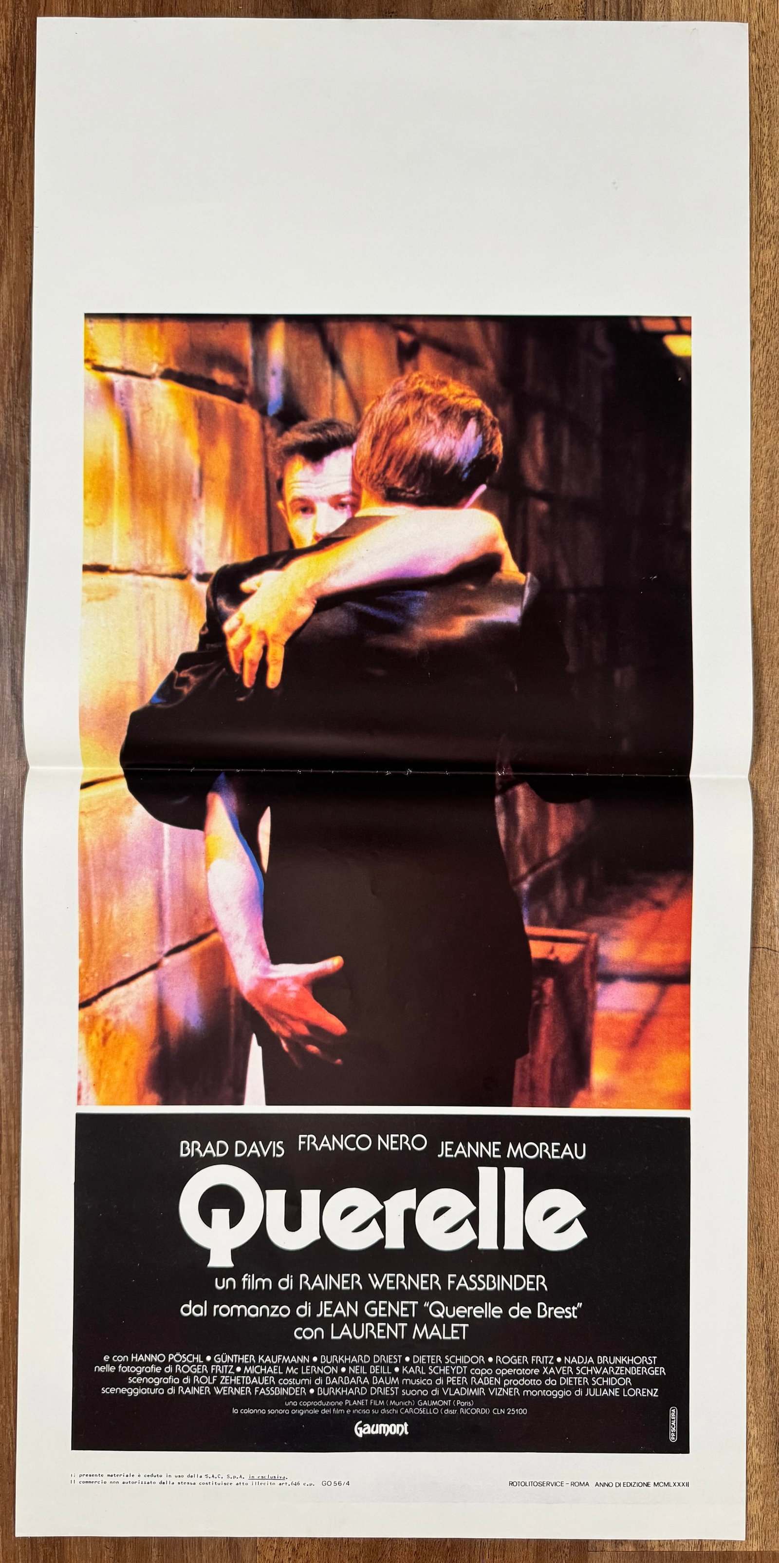 Querelle 1982 Italian Locandino Folded Movie Poster Fassbinder 13x27.5": Querelle (1982) directed by Rainer Werner Fassbinder, starring Brad Davis, Franco Nero and Jeanne Moreau. Original folded Italian locandino poster for the Jean Genet adaptation.