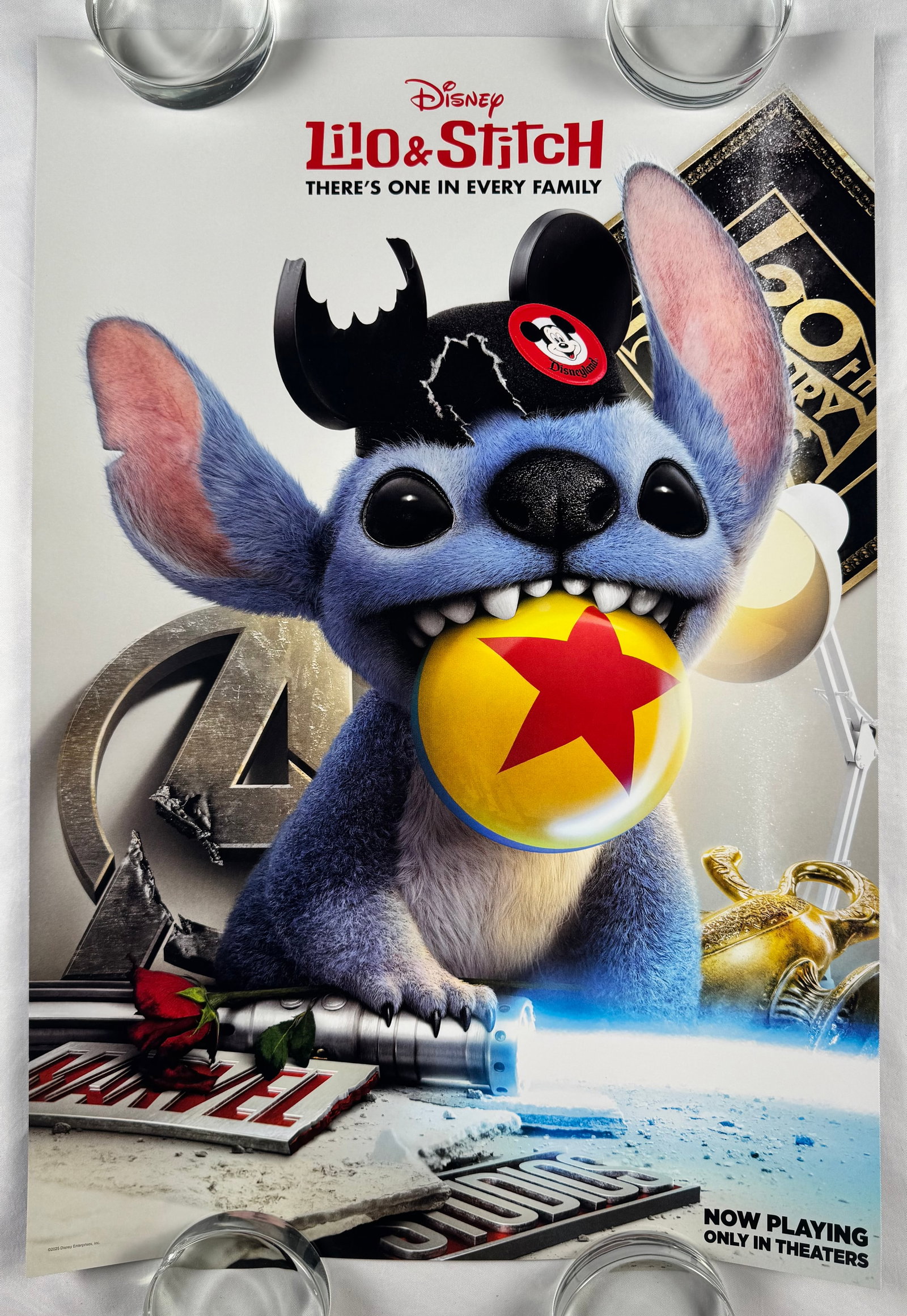 Lilo and Stitch 2025 Mini Pixar Poster Double Sided with Elio: Lilo & Stitch is a 2025 American science fiction comedy adventure film produced by Walt Disney Pictures and Rideback. Directed by Dean Fleischer Camp, it is a live-action animated remake of Disney's 2