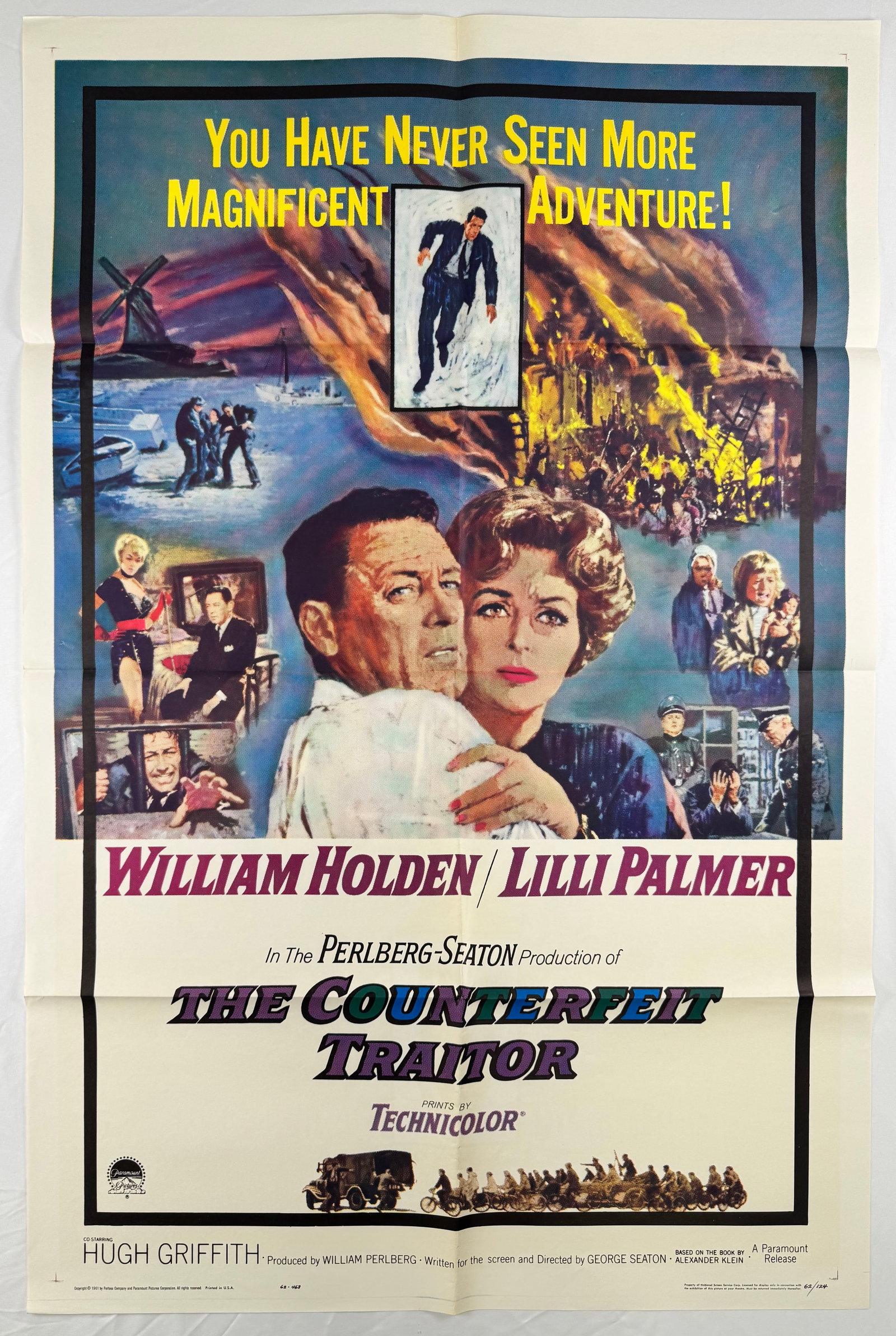The Counterfeit Traitor (1962) 27x41" Original One Sheet Movie Poster Seaton: The Counterfeit Traitor is a 1962 war drama directed by George Seaton and starring William Holden and Lilli Palmer. The poster features dramatic wartime imagery and montage scenes. Ships flat, folded.