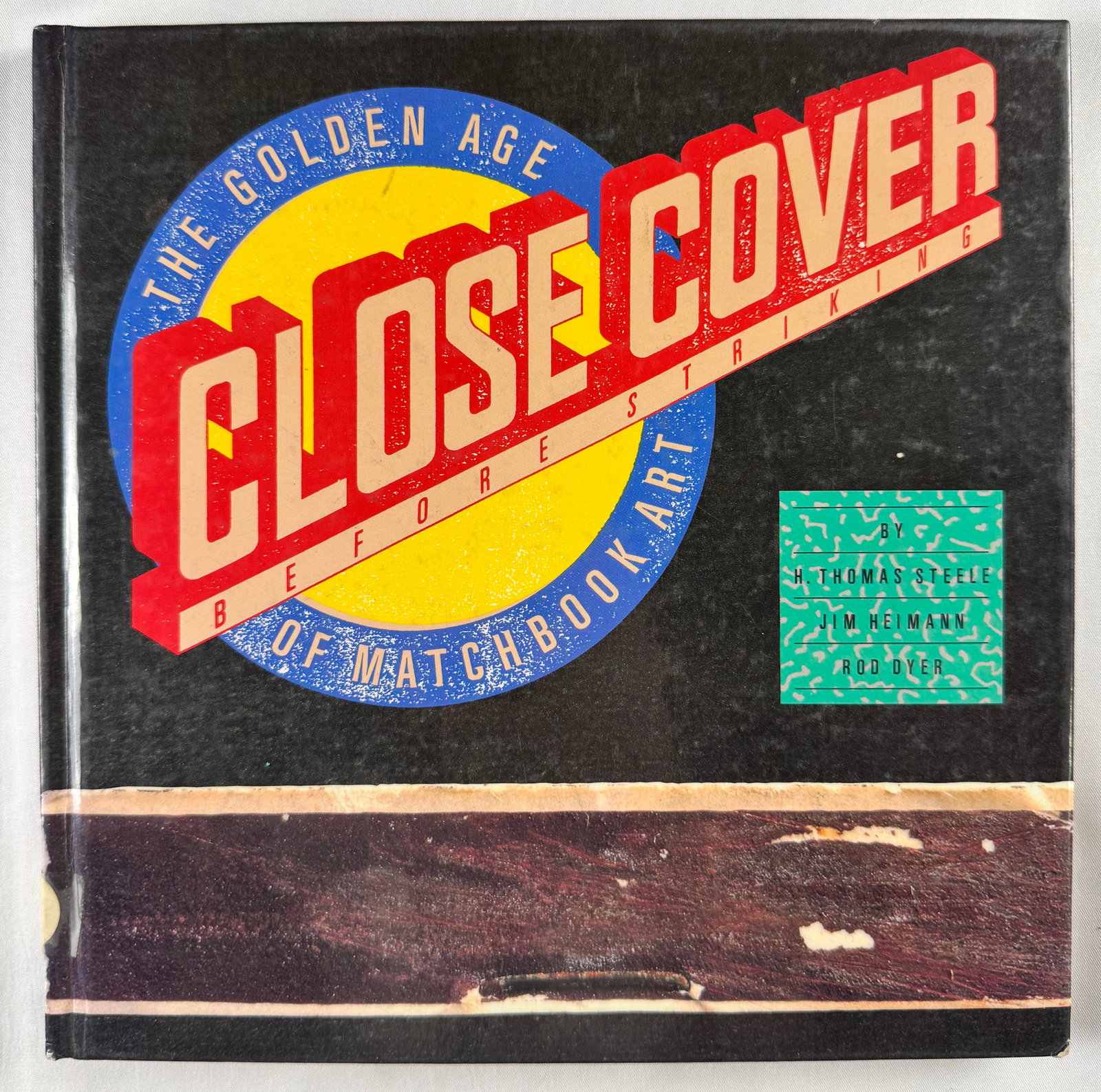 Close Cover The Golden Age of Matchbook Art Hardcover Book 1995: Hardcover book published in 1995 written by H Thomas Steele Jim Heimann and Rod Dyer documenting matchbook cover design.