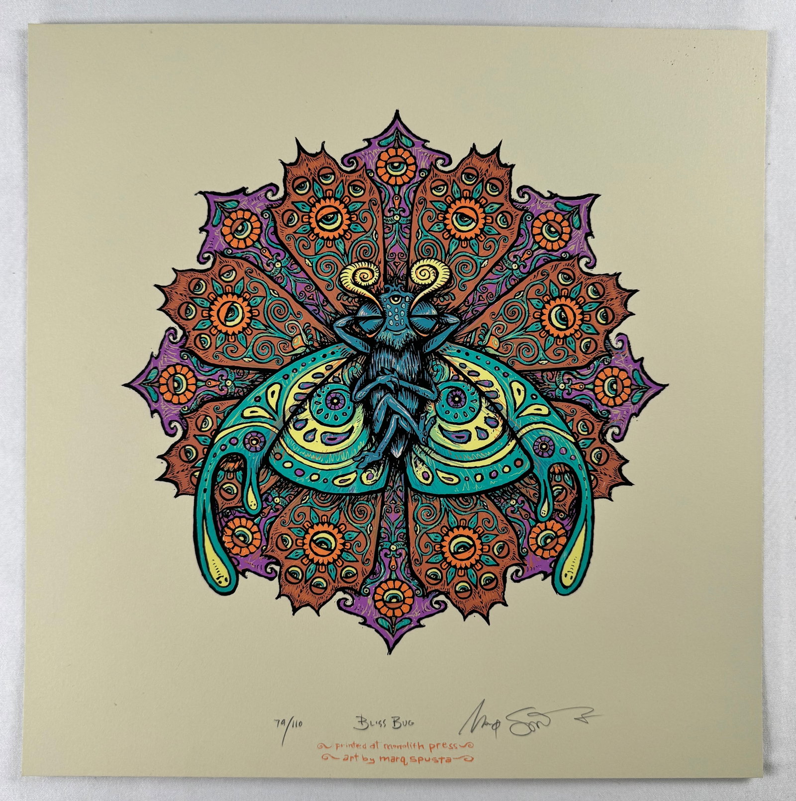 Marq Spusta Signed Numbered 79/110 Bliss Bug Mandala Screen Print 12x12": Screen print titled Bliss Bug depicting an insect centered within a symmetrical mandala design. Signed by Marq Spusta and numbered 79 of 110.