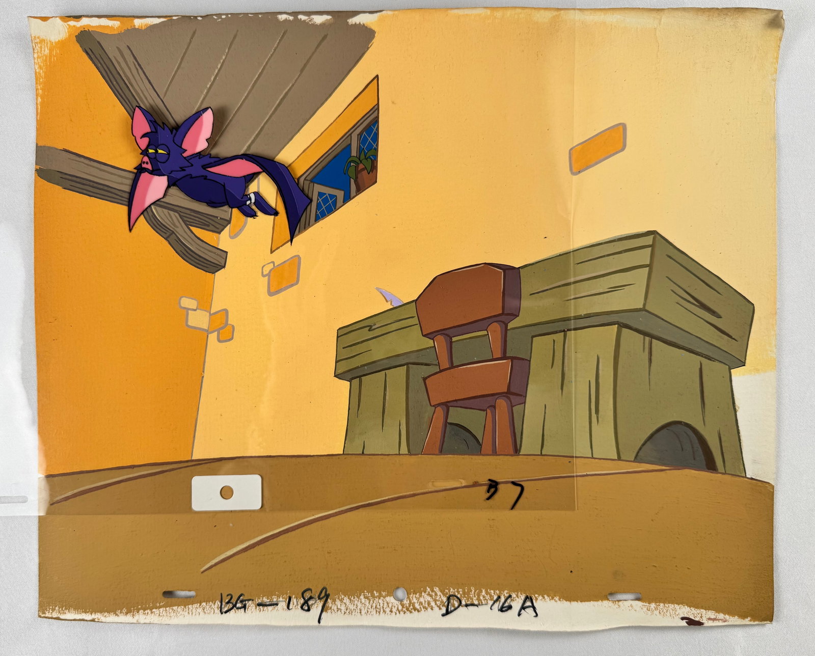 Hand-Painted Animation Background, Fidget the bat from the 1986 Disney film The Great Mouse: Hand-painted animation background featuring a purple bat character hanging near ceiling beams in an interior room setting. The scene includes a desk, chair, window, and warm yellow/orange wall tones.