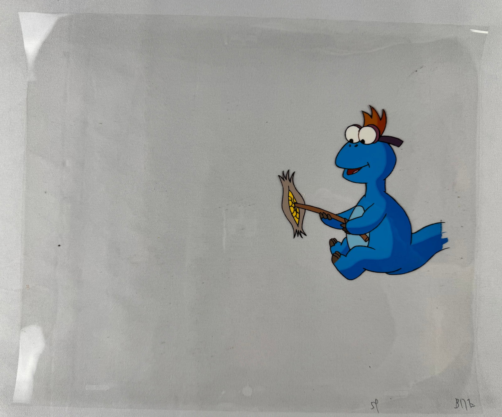 Animation Cel, Truman from Dino Babies Holding Corn Cob (1 of 3)