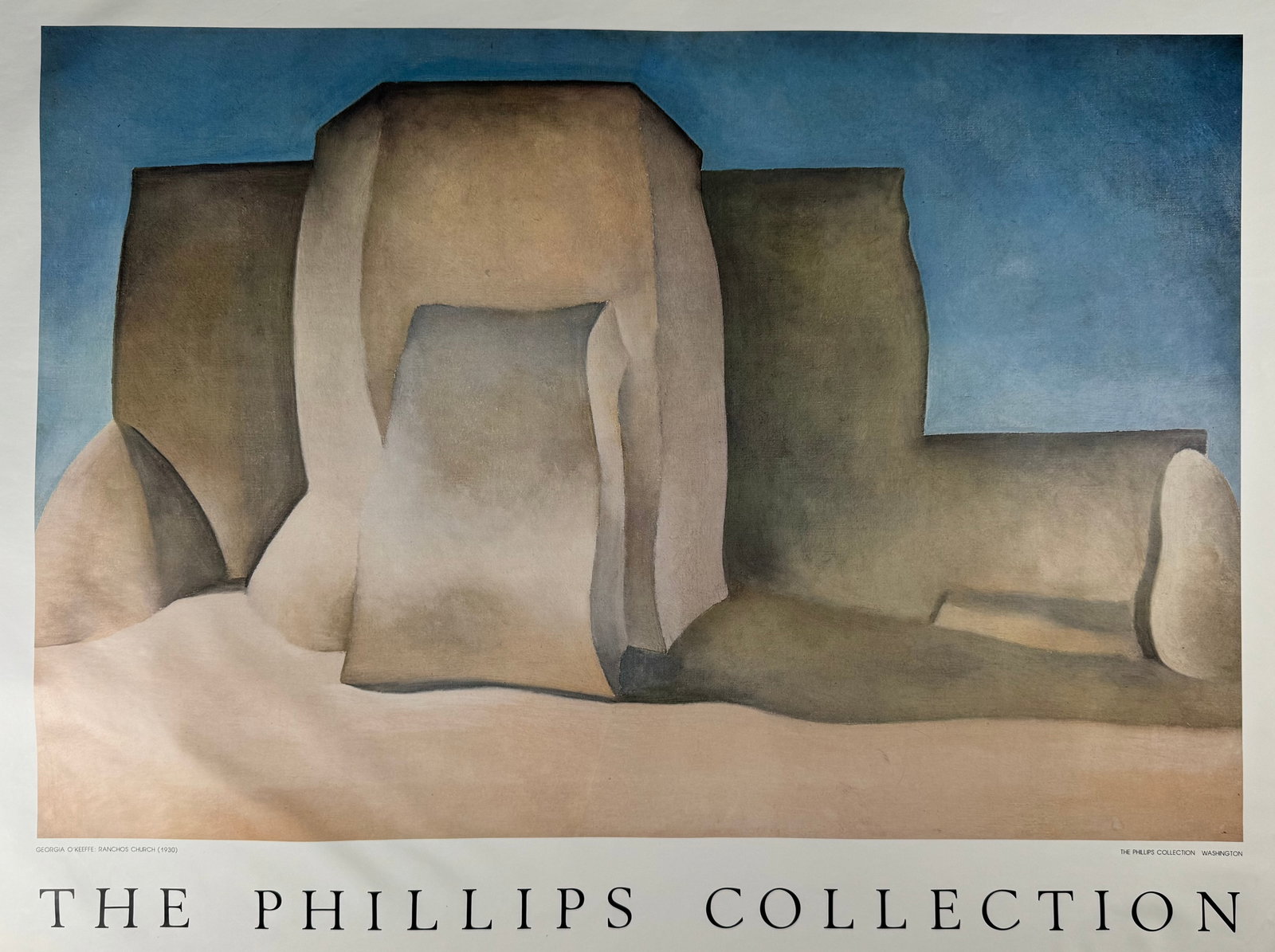 Georgia OKeeffe Ranchos Church Phillips Collection Washington Art Poster 34x25": Poster featuring Georgia O’Keeffe’s Ranchos Church (1930). Published for The Phillips Collection, Washington with title and collection information printed below image.