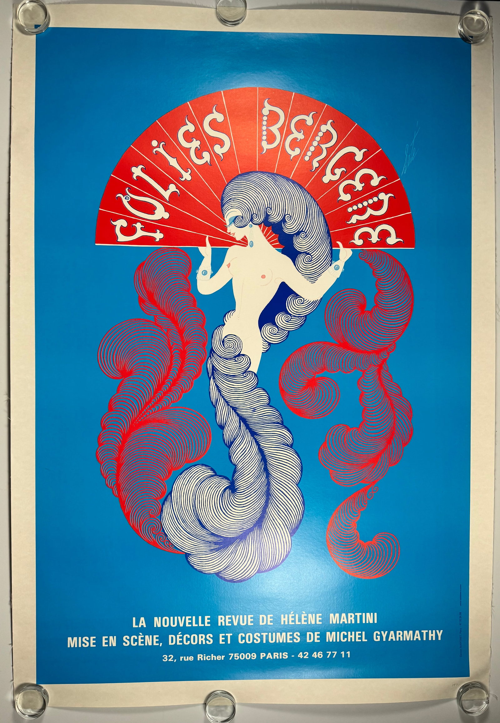 Erte Folies Bergere Paris Linenbacked French Cabaret Poster 49x60": Original linenbacked Erte poster for La Nouvelle Revue de Hélène Martini at the Folies Bergere Paris with design by Michel Gyarmathy. Color poster features a stylized nude female figure with French 