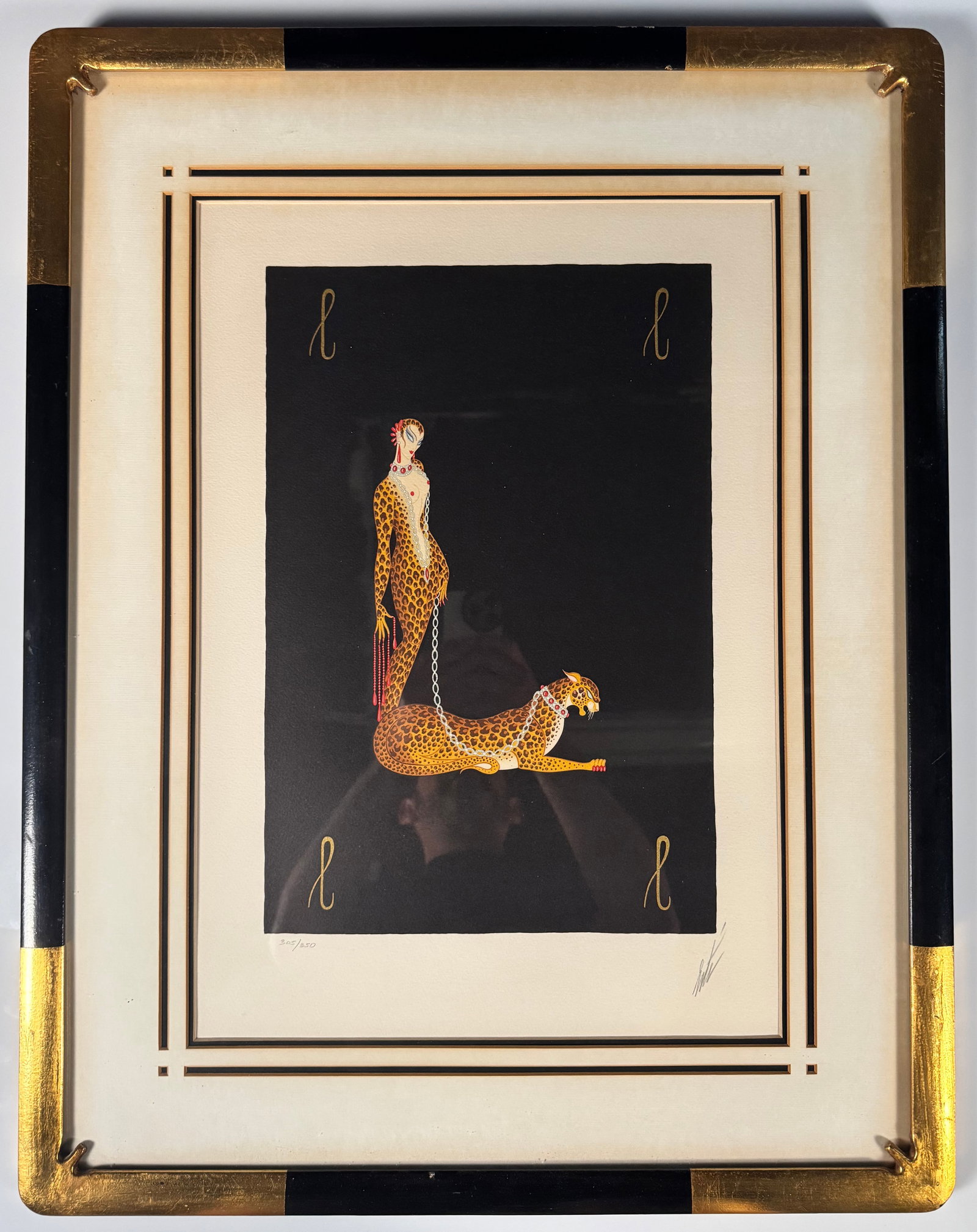 Erte L Hand Signed Numbered Lithograph Serigraph Framed Art Print 14x20": Framed Erte lithograph serigraph titled L depicting a stylized female figure with leopard in an Art Deco composition. Hand signed by Erte, numbered 305/350, with Circle Gallery documentation and origi