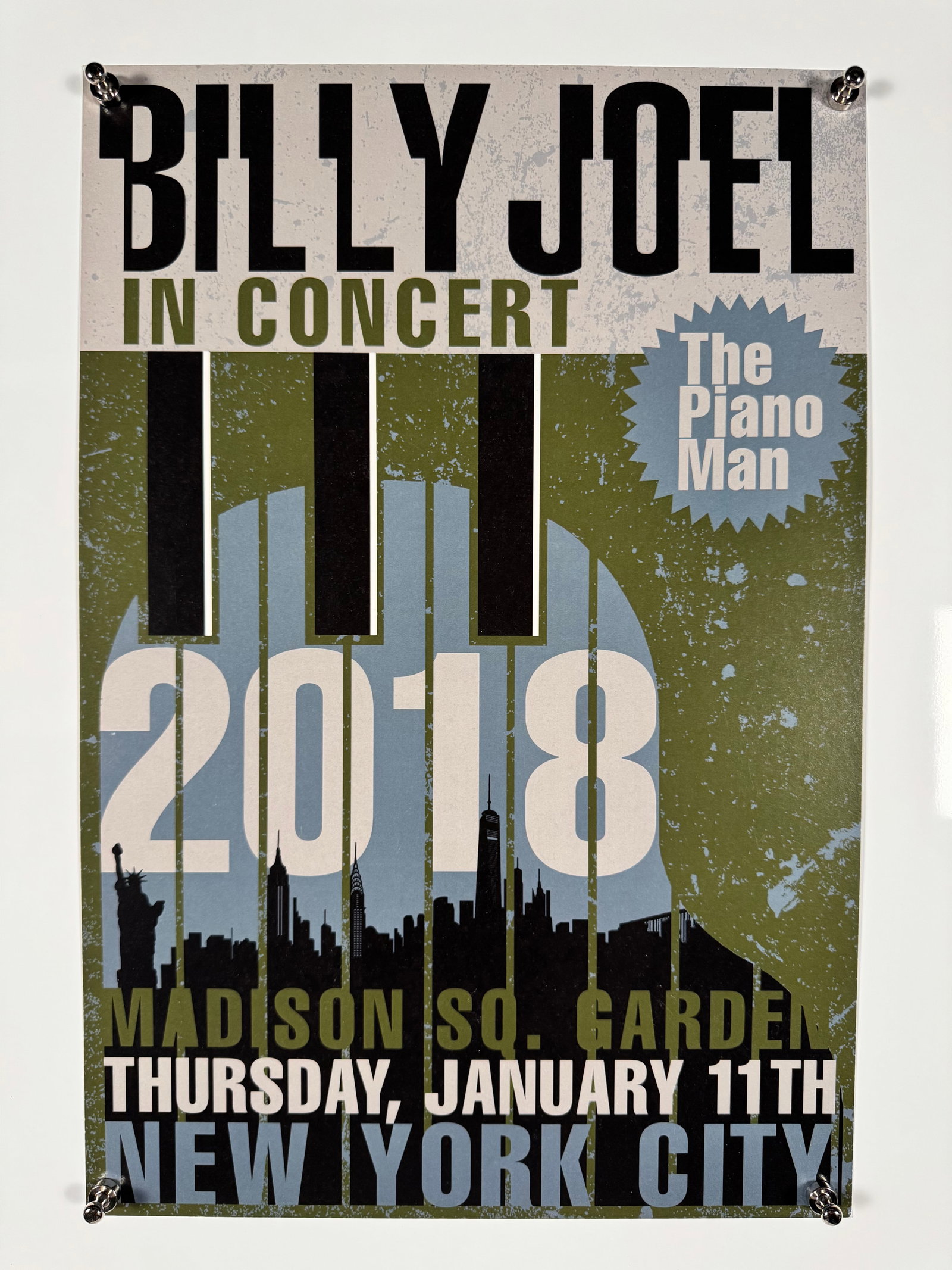 Billy Joel Madison Square Garden 2018 New York Concert Poster: Billy Joel concert poster for the January 11th 2018 performance at Madison Square Garden in New York City. Poster features piano key graphic elements and references "The Piano Man."