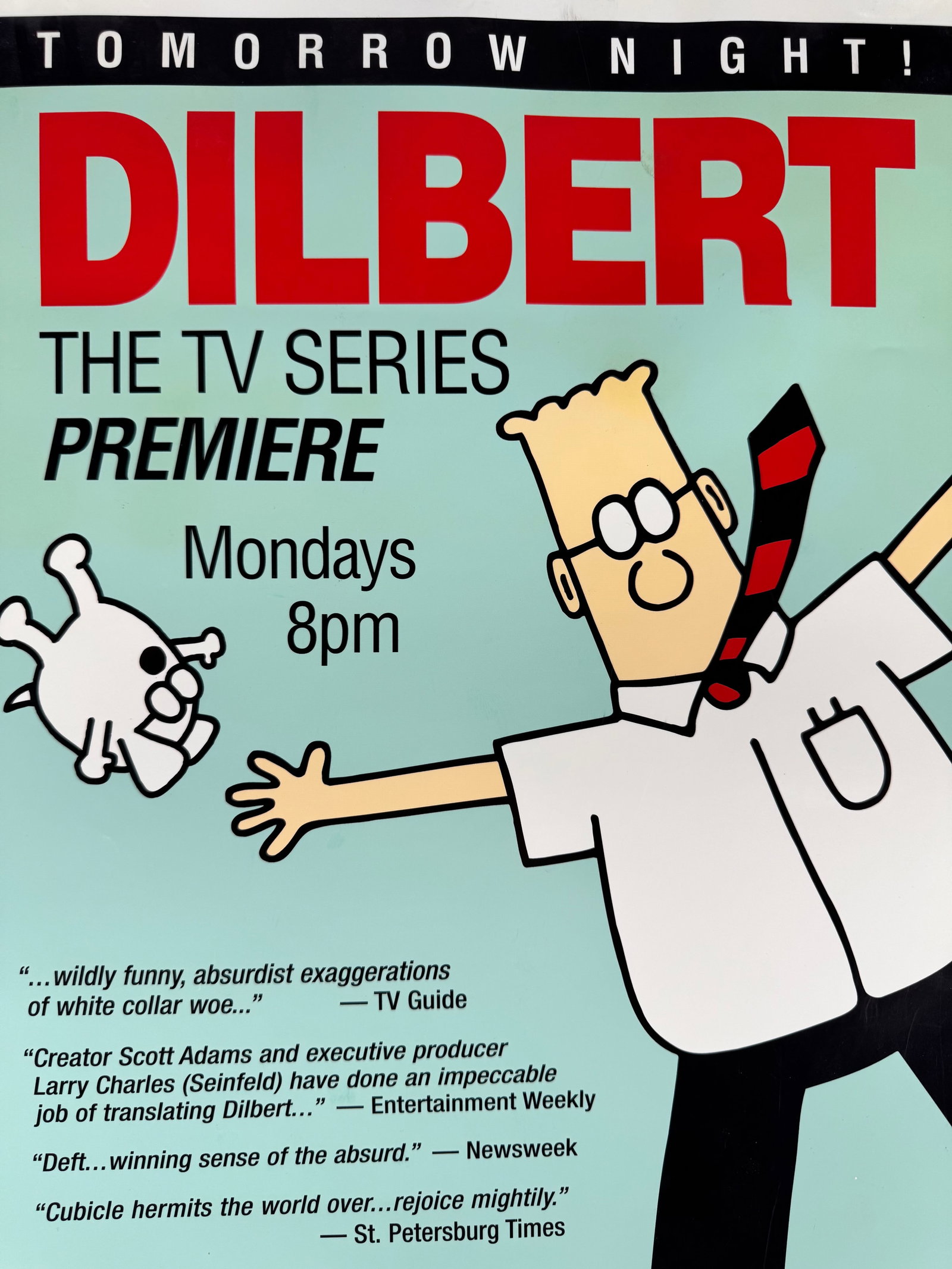 Dilbert TV Series Premiere UPN 13 Los Angeles Times Poster Signed Seth Kearsley COA: This full-page color ROP newspaper advertisement promotes the Dilbert TV series premiere on UPN 13 in Los Angeles. The poster is signed by Seth Kearsley and includes a certificate of authenticity.
