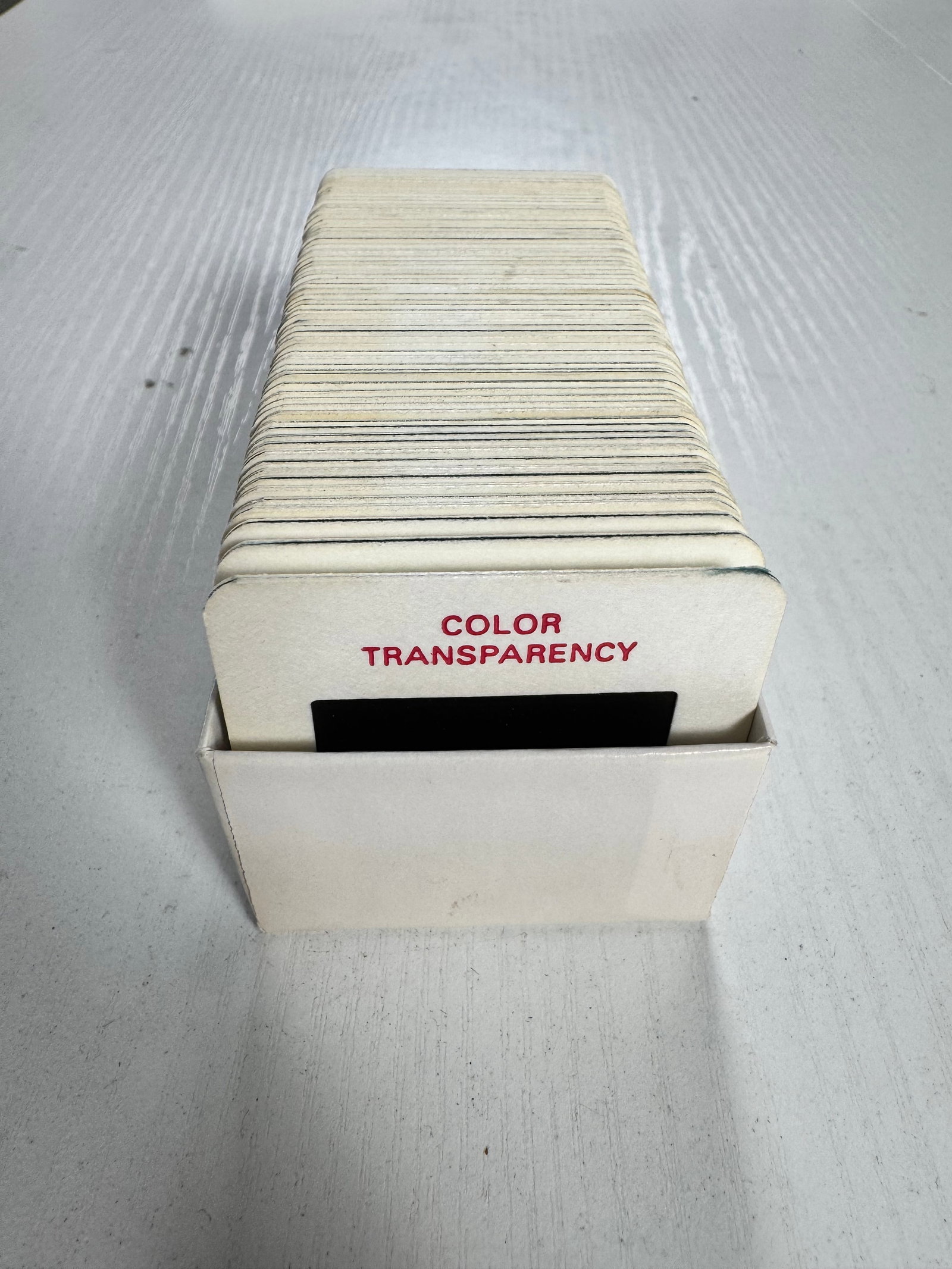 Vintage 35mm Adult Film Color Transparency Slide Collection Lot of 65: Collection of 65 mounted 35mm color transparency slides featuring adult film imagery. Each is individually mounted in a cardboard slide holder labeled Color Transparency. Includes color production and