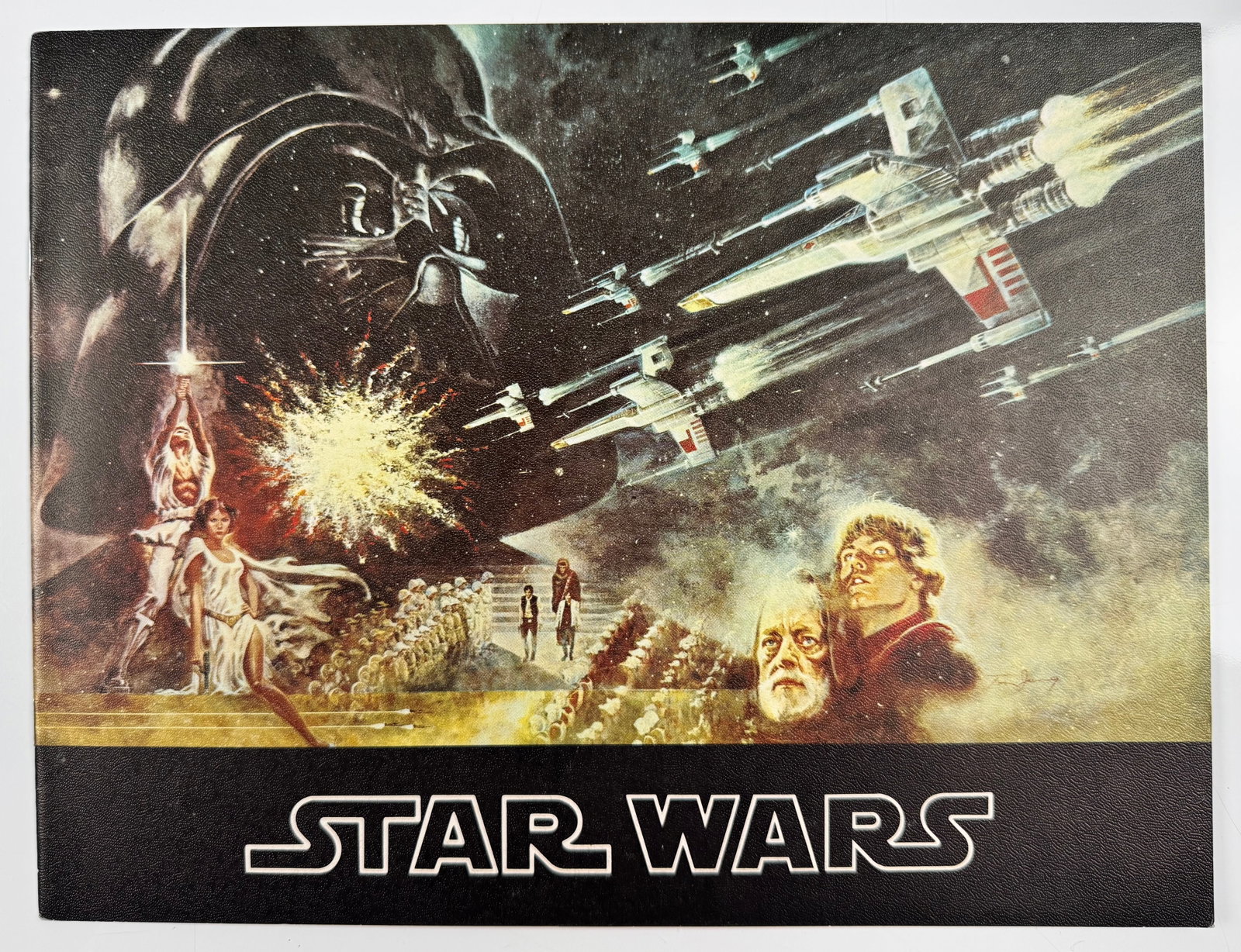 Star Wars 1977 Original Theatrical Souvenir Program Tom Jung Darth Vader Luke Leia: Original 1977 Star Wars souvenir program sold in theaters during the film's initial theatrical release. The cover features Tom Jung's iconic artwork with Darth Vader, Luke Skywalker, Princess Leia, X-