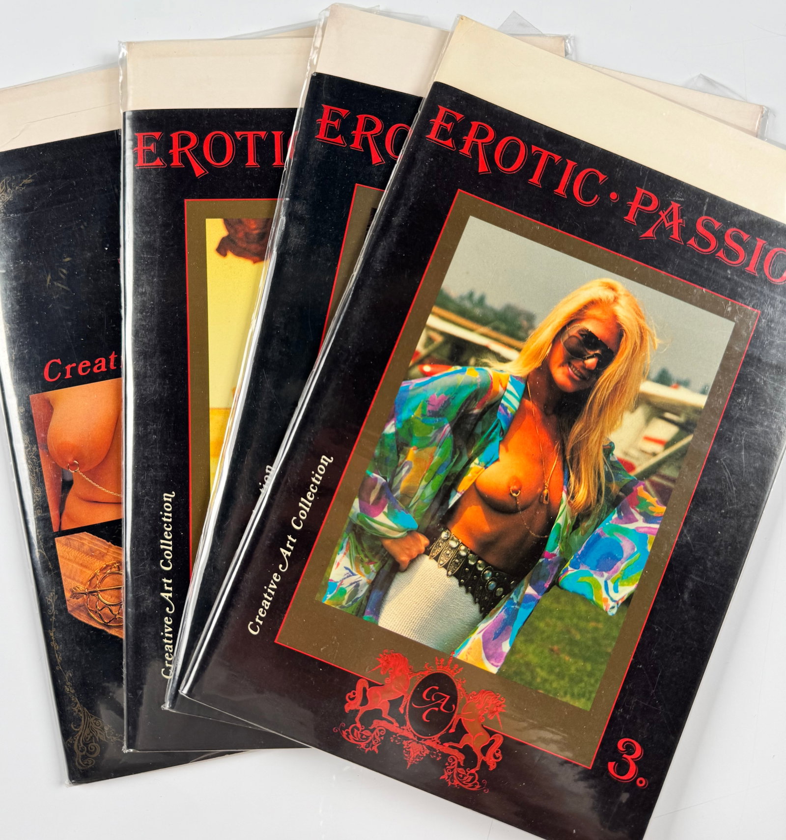 Erotic Passion Nos. 1-4 Creative Art Collection 1990s Fetish Body Piercing Photography Magazines: Four-volume run of Erotic Passion, comprising Nos. 1 through 4 and published by Creative Art Collection of Luxembourg. The illustrated adult magazines feature female fetish photography focused on body