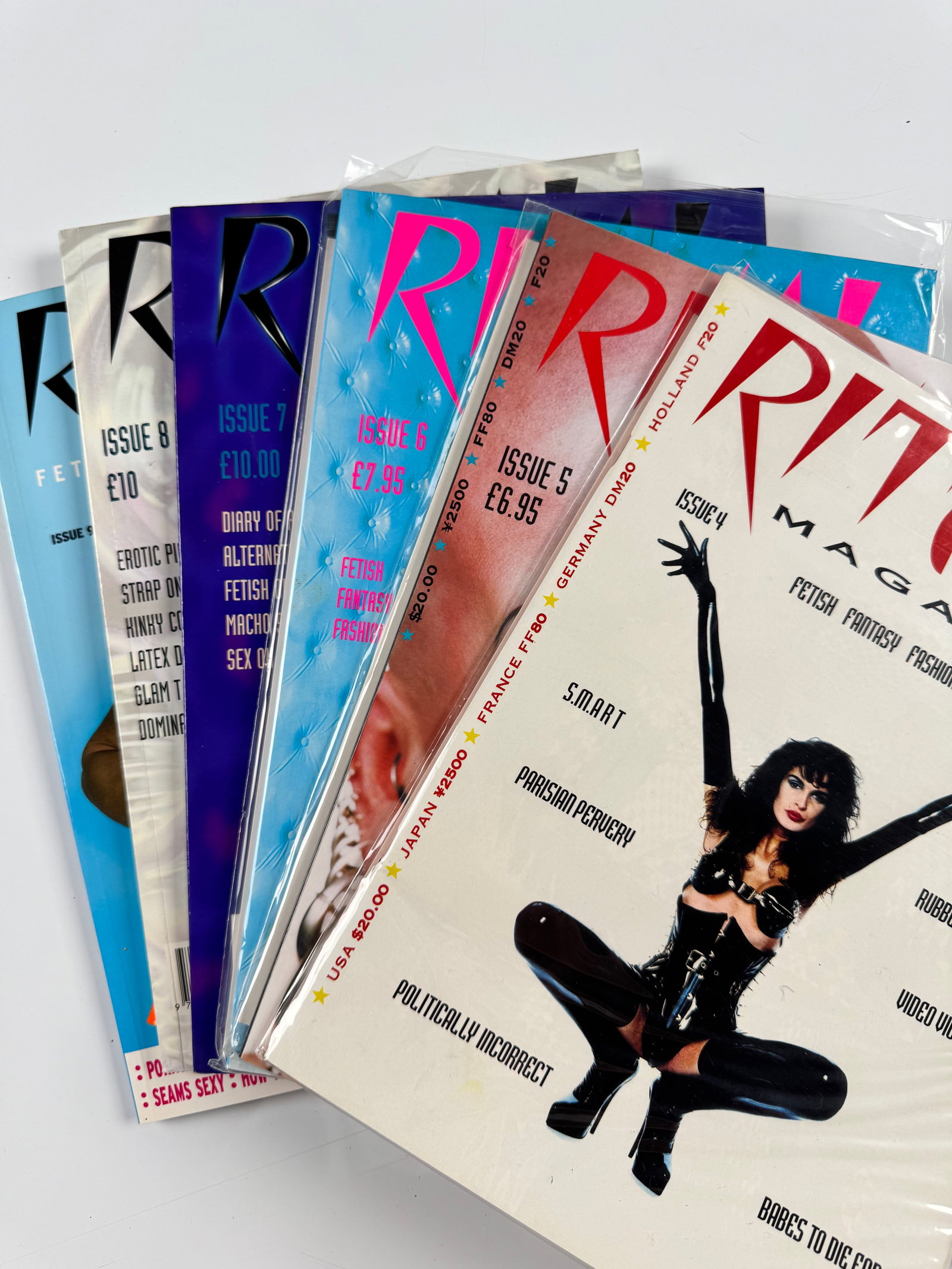 Ritual Magazine Issues 4-9 1990s Fetish Latex BDSM Body Piercing Fashion Lot of 6: Six consecutive issues of Ritual Magazine, comprising Issues 4 through 9. British alternative fetish publication devoted to fetish fashion, latex, BDSM, body piercing, dominatrix culture and related u