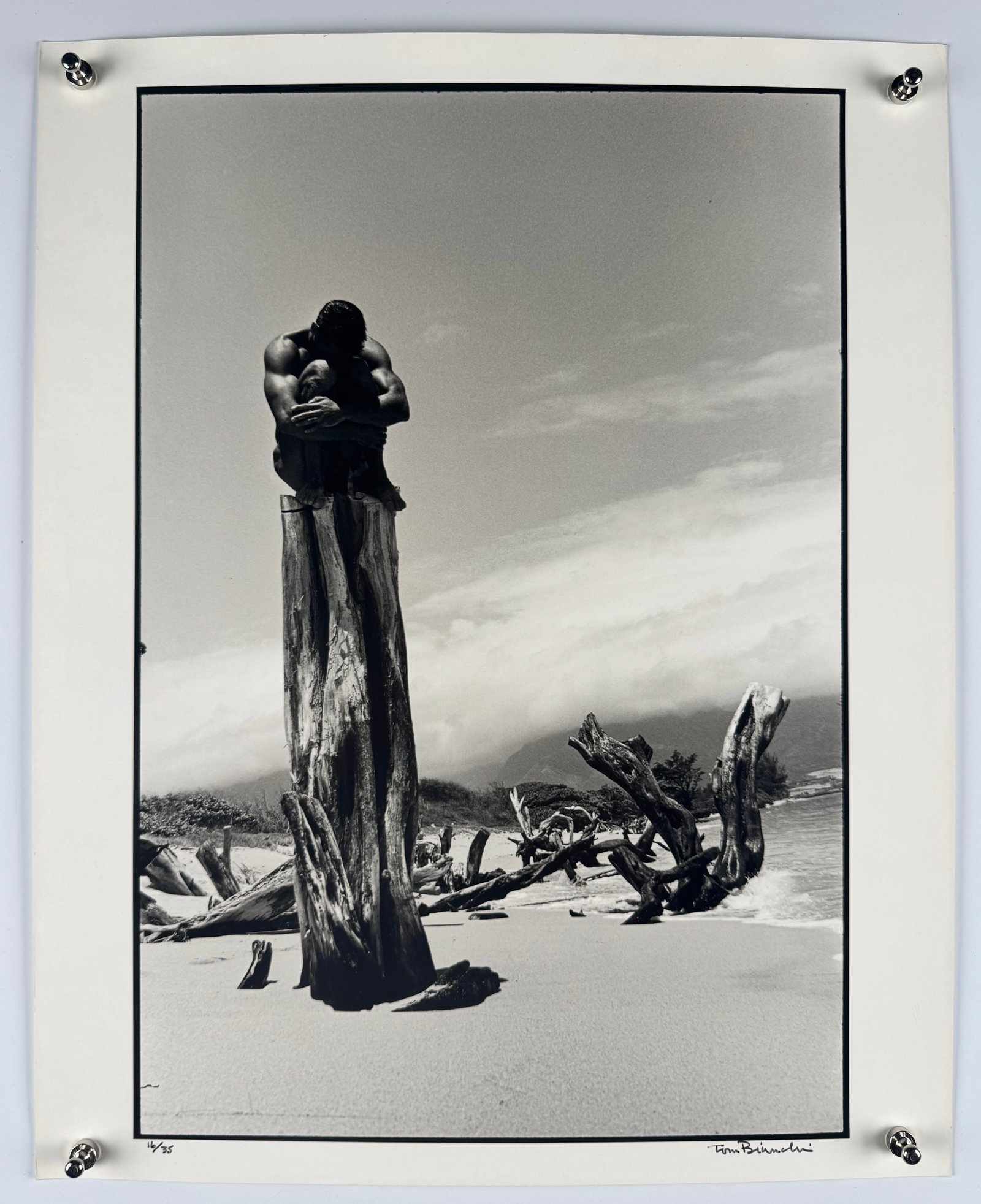 Tom Bianchi Carl on a Pedestal 1990 Signed 16/35 Out of Studio Homoerotic Gay Male Nude Silver Print: Carl on a Pedestal is a 1990 vintage gelatin silver print by American photographer Tom Bianchi from his Out of the Studio series. The photograph is signed, dated, and numbered 16/35 in pencil along th