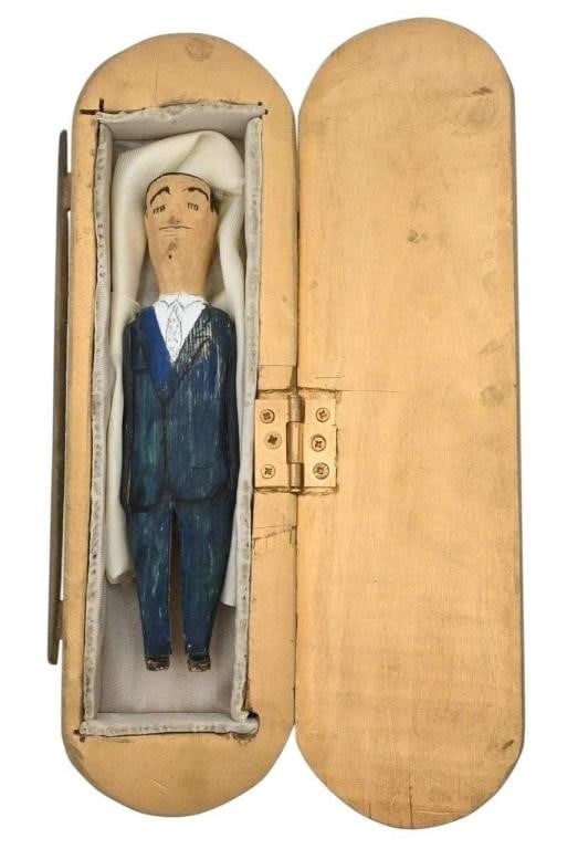 Ed Cooper.  Man in Coffin (1 of 8)