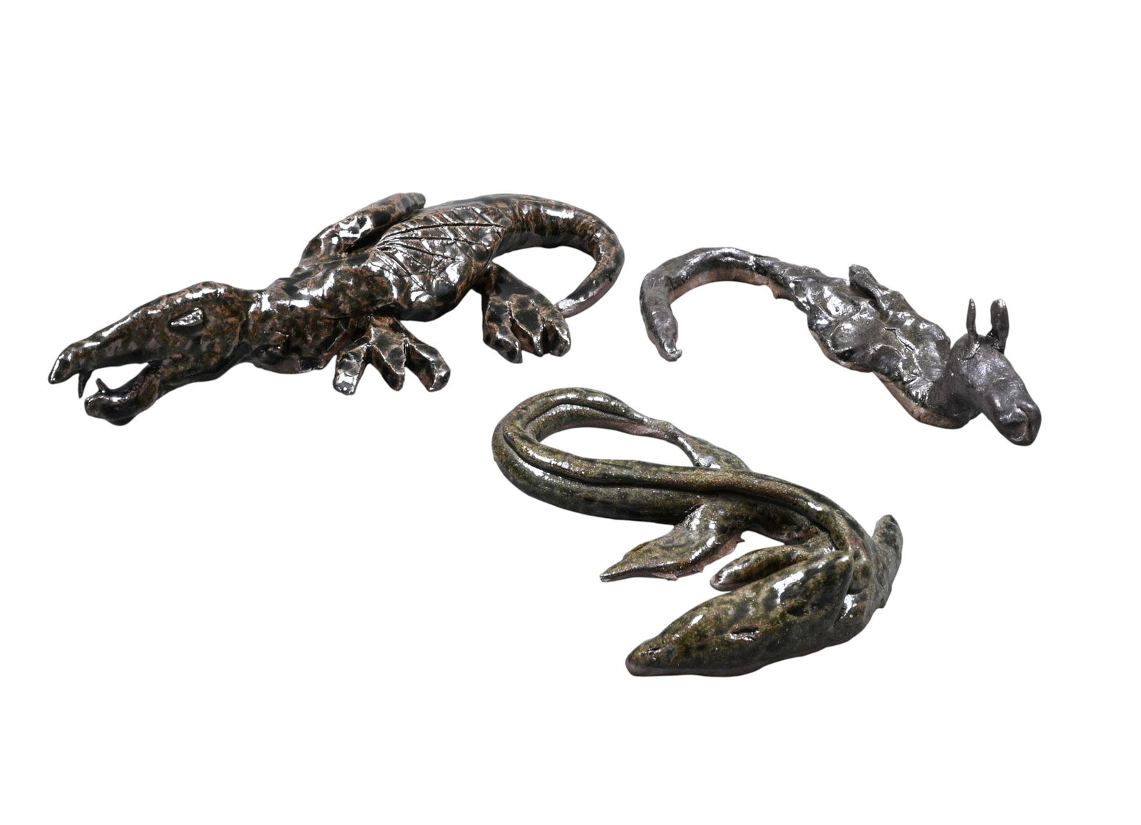 Clay Meaders. Dragons: Clay Meaders. Dragons.1999, 2001, 2003. Signed and Dated. Pinch pottery. Mint condition. Size: Largest is 2.5" H x 12" W x 6" D. Provenance: Private Georgia Collection. Est. $50 - $200. 