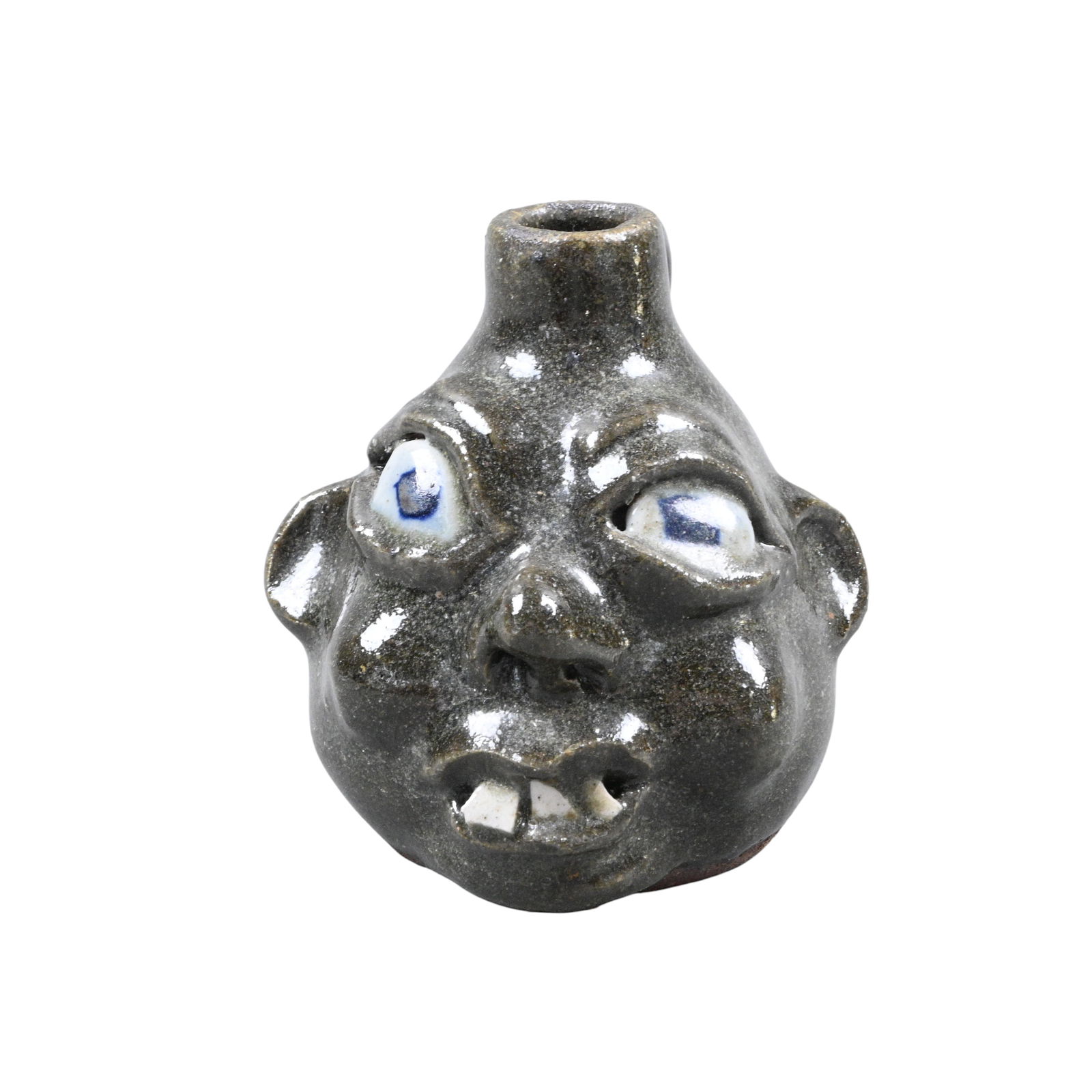 Grace Nell Hewell. Mini Face Jug: Grace Nell Hewell. (1933-2016) Mini Face Jug. 1999. Signed and Dated. Mint condition. Size: 3" H. Provenance: Private Georgia Collection. Est. $50 - $100. Ship: In-House Shipping Available.