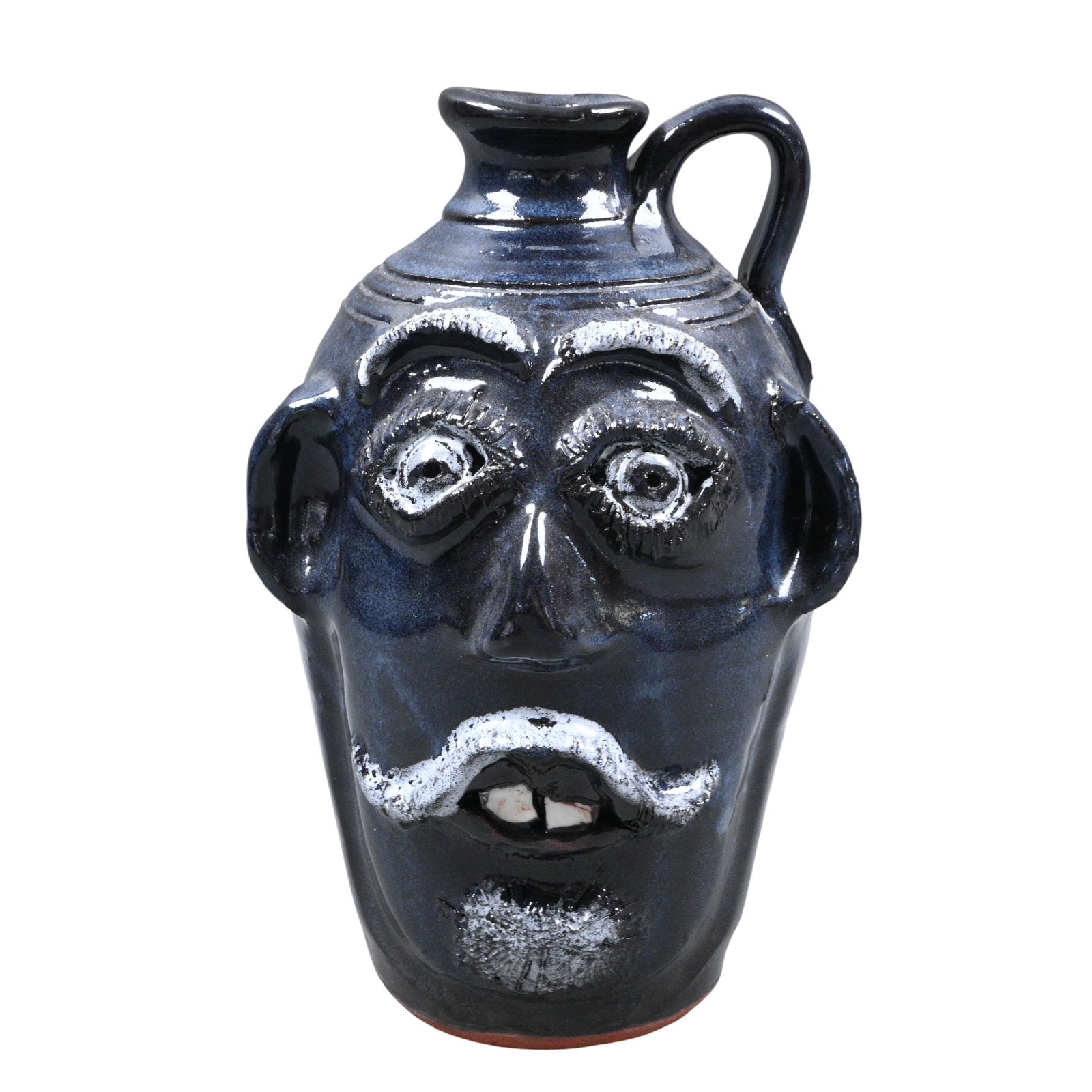 Bobby Ferguson. Dark Blue Face Jug: Bobby Ferguson. (1933-2005)Dark Blue Face Jug.2004. Signed and Dated. Mint condition. Size: 8.5" H. Provenance: Private Georgia Collection. Est. $200 - $400. Ship: In-House Shipping