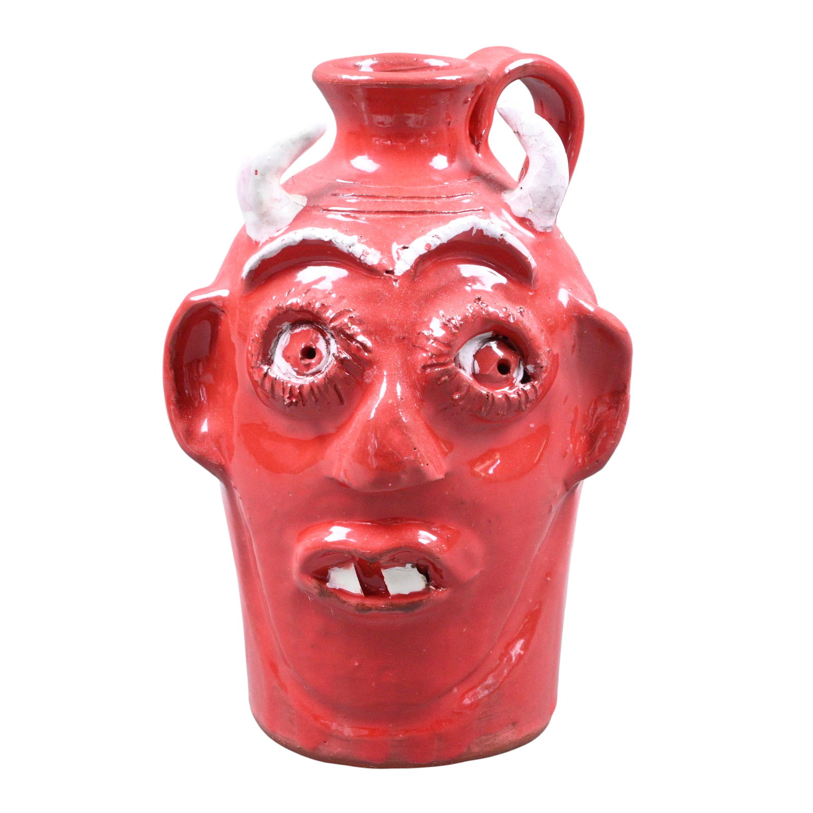 Mary and Stanley Ferguson. Red Devil Face Jug: Mary and Stanley Ferguson. Red Devil Face Jug.2005. Signed and Dated. Mint condition. Size: 8" H. Provenance: Private Georgia Collection. Est. $50 - $100. Ship: In-House Shipping Available.