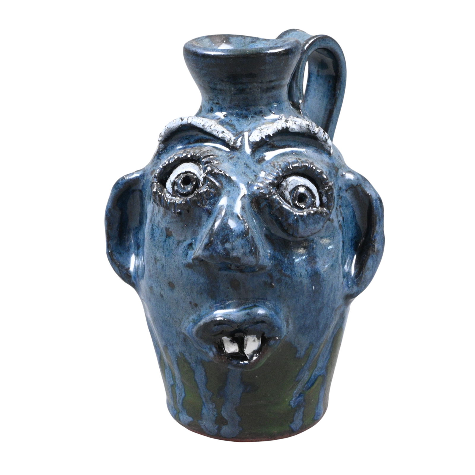 Mary and Stanley Ferguson. Small Blue Face Jug: Mary and Stanley Ferguson. Small Blue Face Jug.2005. Signed and Dated. Mint condition. Size: 6" H. Provenance: Private Georgia Collection. Est. $50 - $100. Ship: In-House Shipping Available.