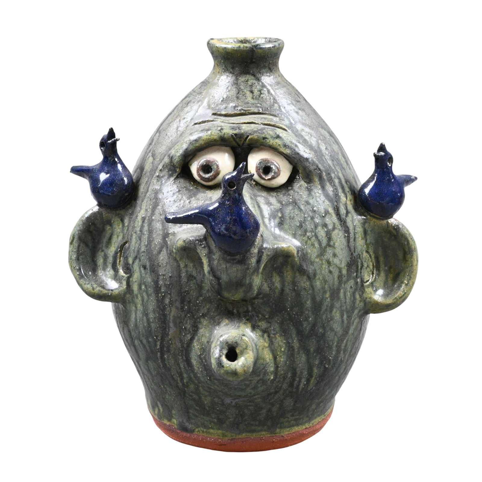 Brian Wilson. Face Jug with Blue Birds: Brian Wilson. Face Jug with Blue Birds.2001. Signed and Dated. Tabacco-spit glaze. Mint condition. Size: 8.5" H. Provenance: Private Georgia Collection. Est. $100 - $300. Ship: In-House