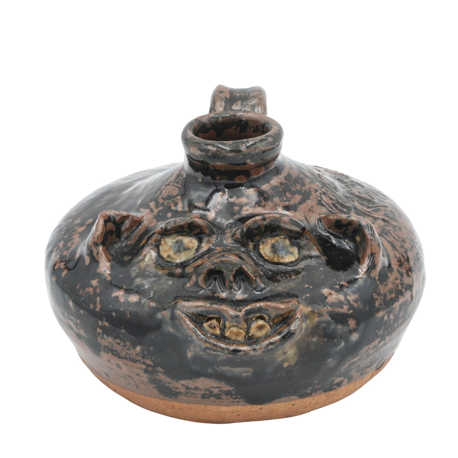 Marie Rogers. Buggy Face Jug: Marie Rogers. (1922-2010)Buggy Face Jug.Signed twice. Mint condition. Size: 4" H x 6" W. Provenance: Private Georgia Collection. Est. $100 - $200. Ship: In-House Shipping Available.