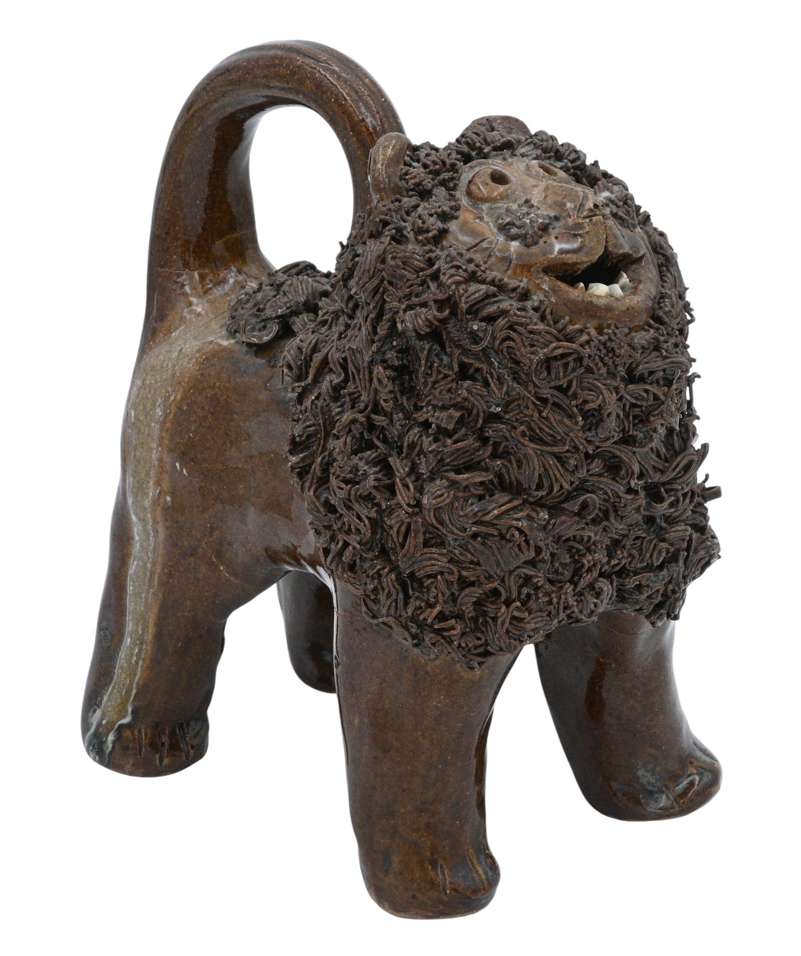 Crystal King. Lion: Crystal King. (b. 1978)Lion.Signed. Great face on the lion. Good condition. Glaze cracking during firing. Size: 7.75" H x 6.5" W x 4" D. Provenance: Micki Beth Stiller Collection. Purchased