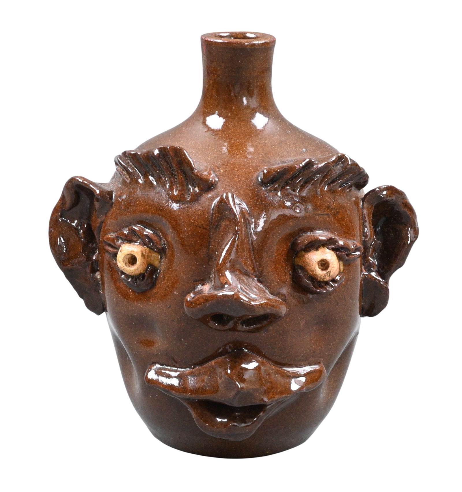 G.F Cole. Face Jug: G.F Cole. (1919-1991)Face Jug.1983. Signed, Dated, and Stamped. Mint condition. Size: 7" H. Provenance: Prominent Private Kentucky Collection. Est. $100 - $300. Ship: In-House Shipping