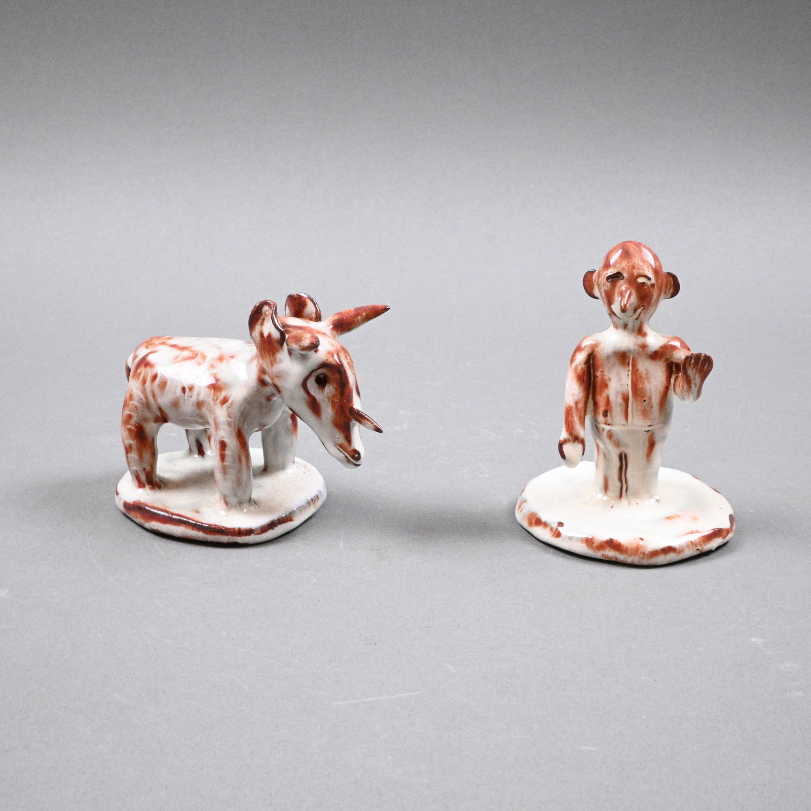 Cole Pottery. Three Horned Critter with Man: Cole Pottery. Three Horned Critter with Man. 1983. Initialed and Dated. Initialed P.S. on bottom. Seagrove, NC. Excellent condition. Size: Man is 4" H. Provenance: Larry Hackley Collection. Est. $100