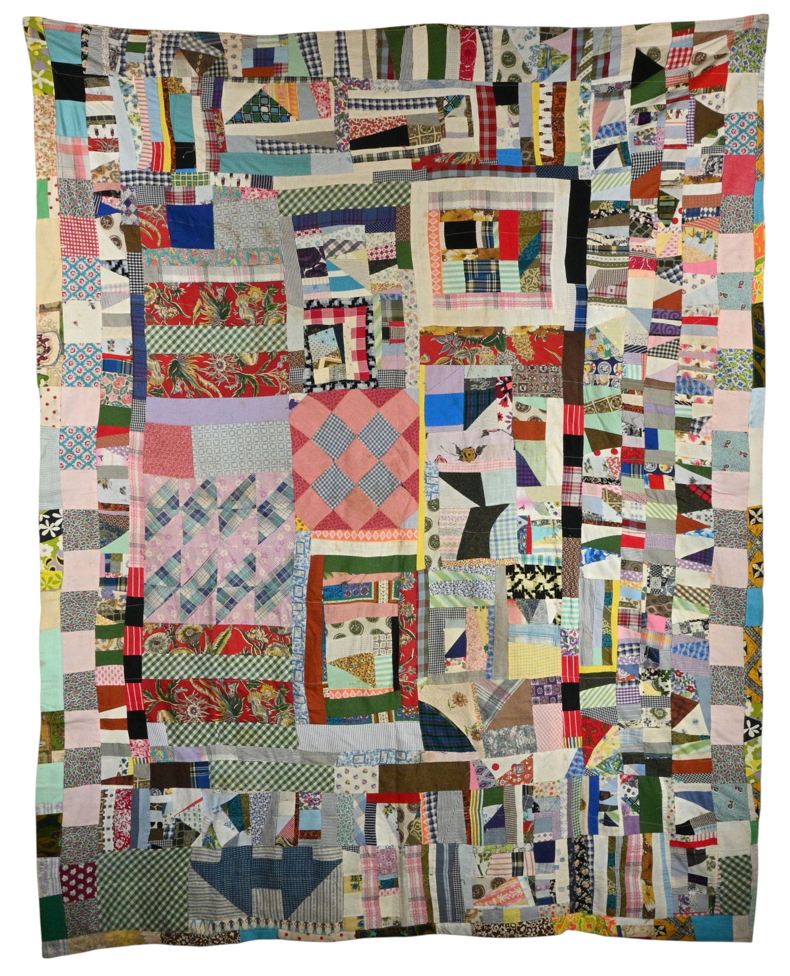 Double-sided Patchwork Folk Quilt: Double-sided Patchwork Folk Quilt. Hand pieced quilt composed of multicolored cotton scraps arranged in a loose log cabin inspired format on one side and a loose irregular grid on the other side. 