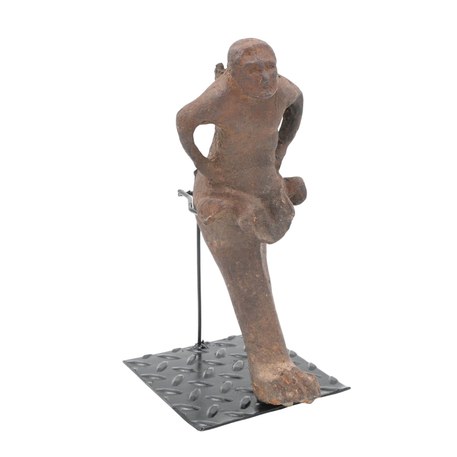 Cast Iron Figure: Cast Iron Figure. Circa 1800's. This figure dates from the 19th century and was found in Tennessee. It has a dark, oxidized, weathered surface. The face was hand formed. The back is open and