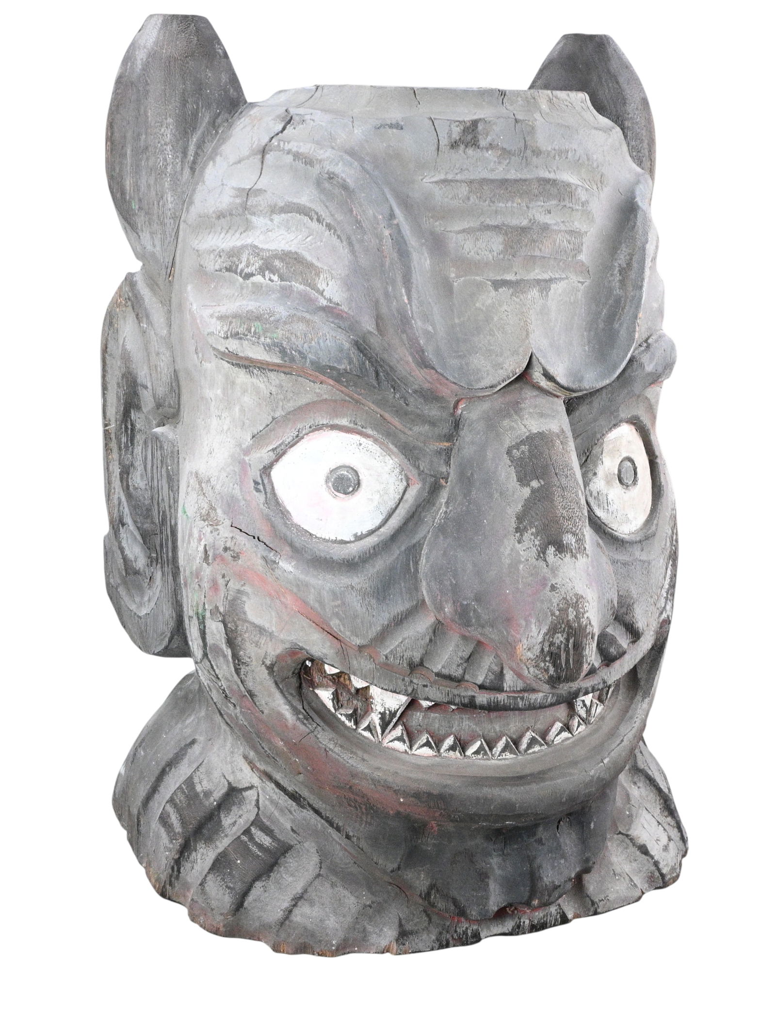 Large American Circus Wagon Fragment Carved As Demonic Bust: Large American Circus Wagon Fragment Carved As Demonic Bust. A hand carved wooden grotesque head depicting a demonic or devil-like figure. Possibly created as a carnival folk object or attached to