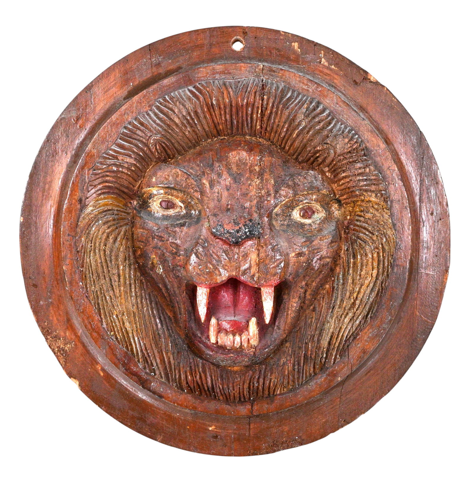 Double Sided Lion Face Carousel Medallion: Double Sided Lion Face Carousel Medallion. A carved wooden carousel medallion depicting a fierce lion's head in high relief, with bared fangs and radiating mane carved in bold, rhythmic strokes. 