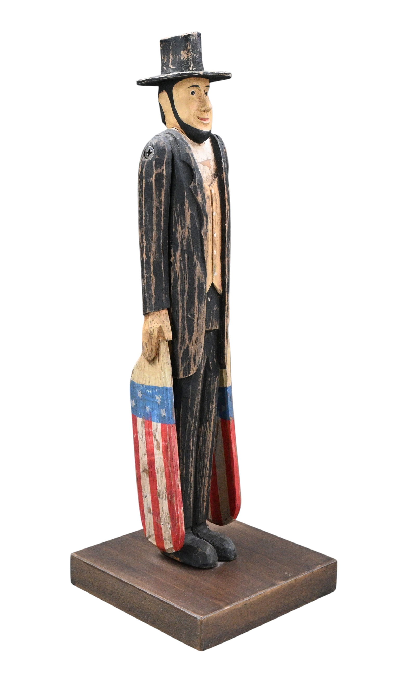 Abraham Lincoln: Carved Wooden Whirligig: Abraham Lincoln: Carved Wooden Whirligig. A contemporary painted wood carving depicting Abraham Lincoln. Good condition. Some surface wear. Size: 11.75" H x 4" W x 4" D. Provenance: Private