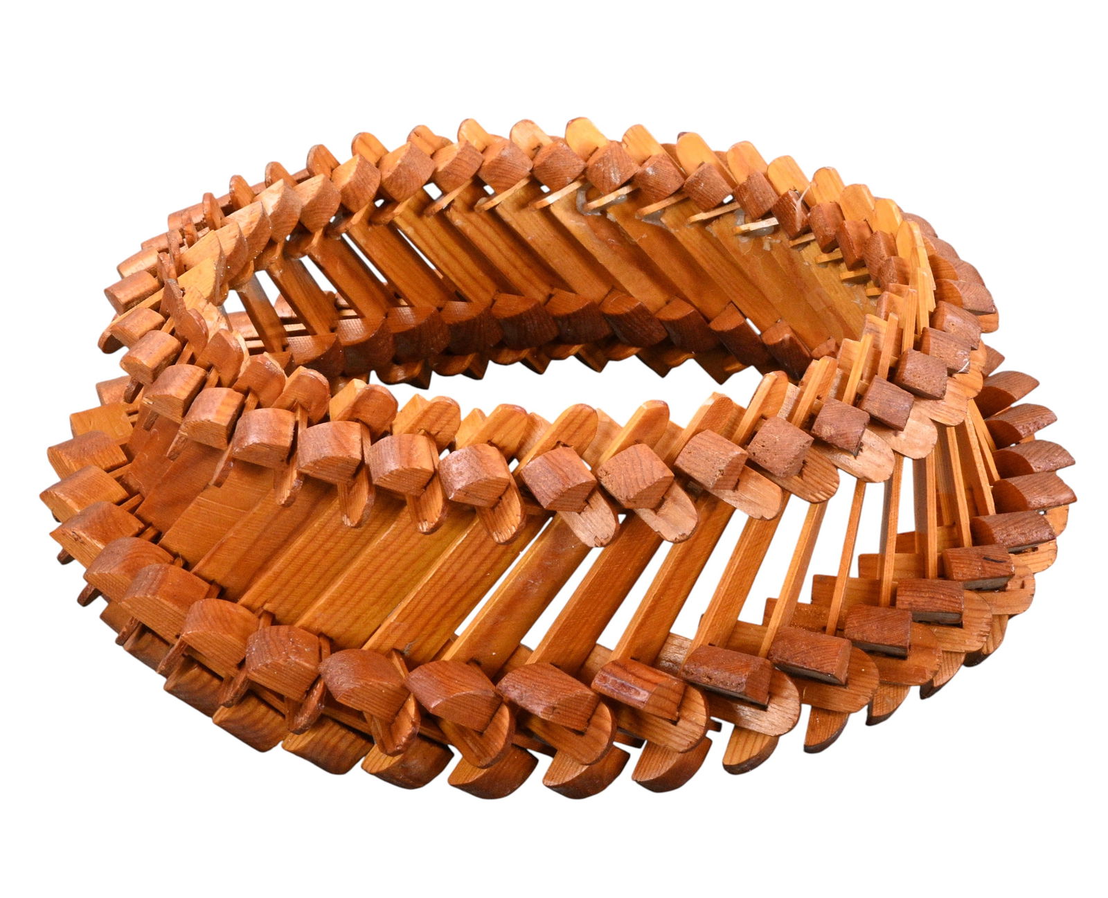 Tramp Art Wooden Circular Frame: Tramp Art Wooden Circular Frame. Handmade tramp art wooden frame constructed from layered, notched wooden elements arranged in a continuous circular form. Good condition. Some white paint splatter