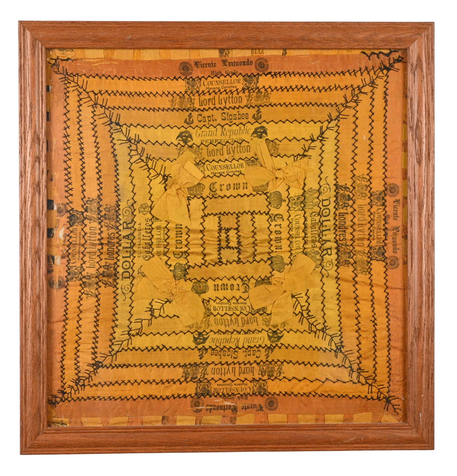 Tobacco Silk Assemblage: Tobacco Silk Assemblage. Cira late 1800s or early 1900s. Stitched and framed cigar silks mounted behind glass. Tobacco silks were decorative cloth inserts placed inside cigar boxes in the late 19th an