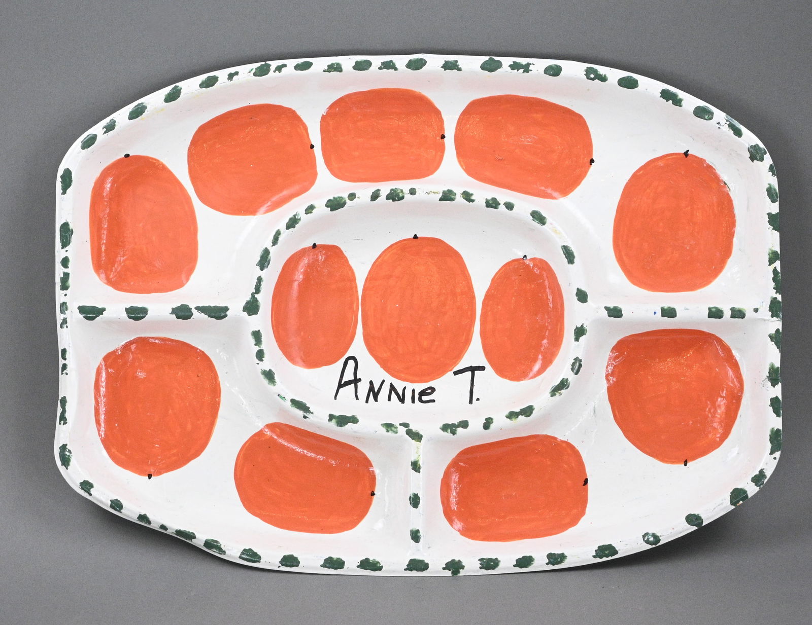 Annie Tolliver. Tomato Platter: Annie Tolliver. (1950-2018) Tomato Platter. 2017. Signed and Dated. Plastic food platter in sections with tomatoes. Good condition. Some edge wear. Size: 13.25" H x 18.5" W. Provenance: Micki Beth Sti