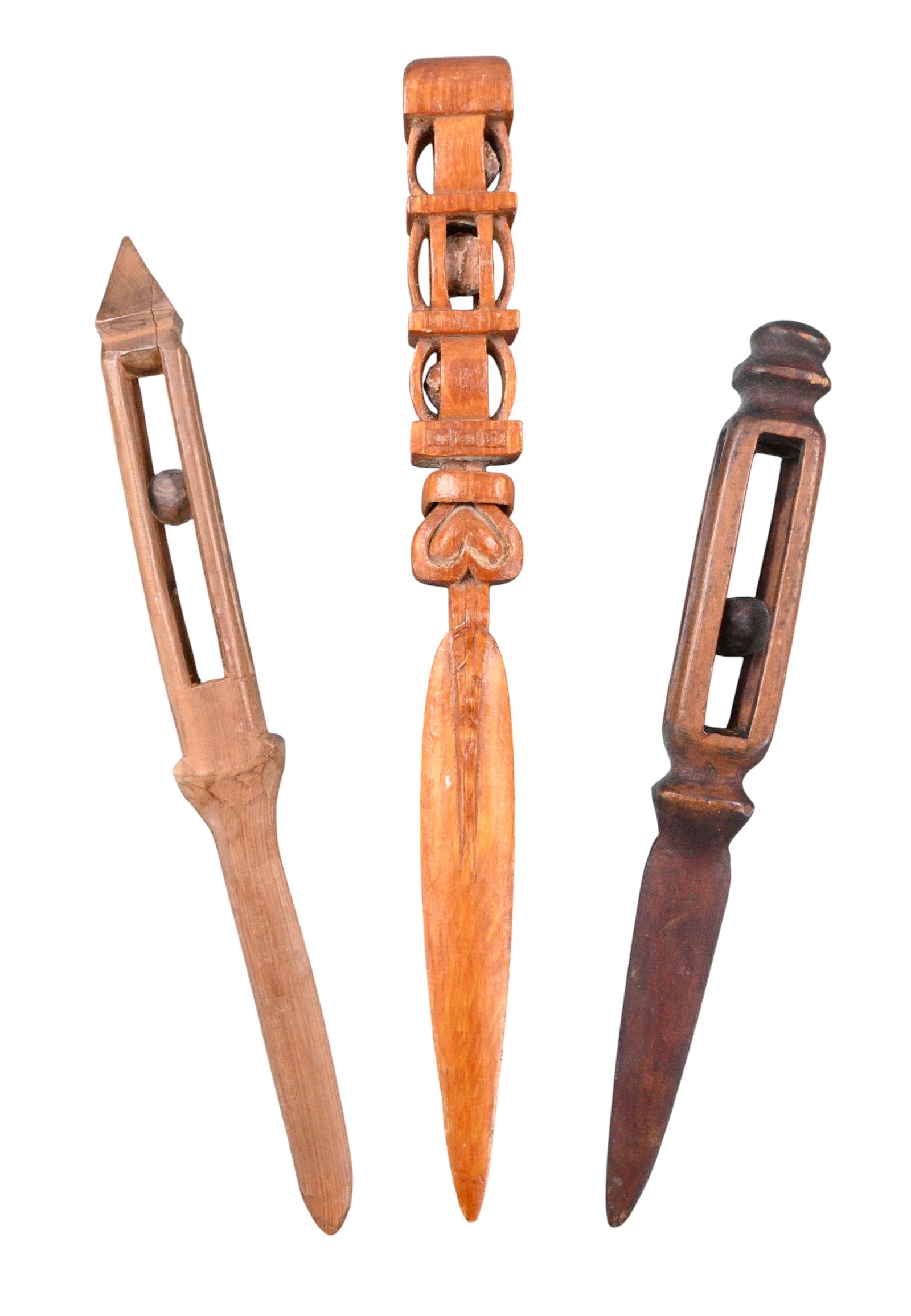 Trio of Hand Carved Folk Art Whimsy Letter Openers: Trio of Hand Carved Folk Art Whimsy Letter Openers. A group of three hand carved wooden letter openers, distinguished by pierced openwork construction and sculptural form. The center piece is