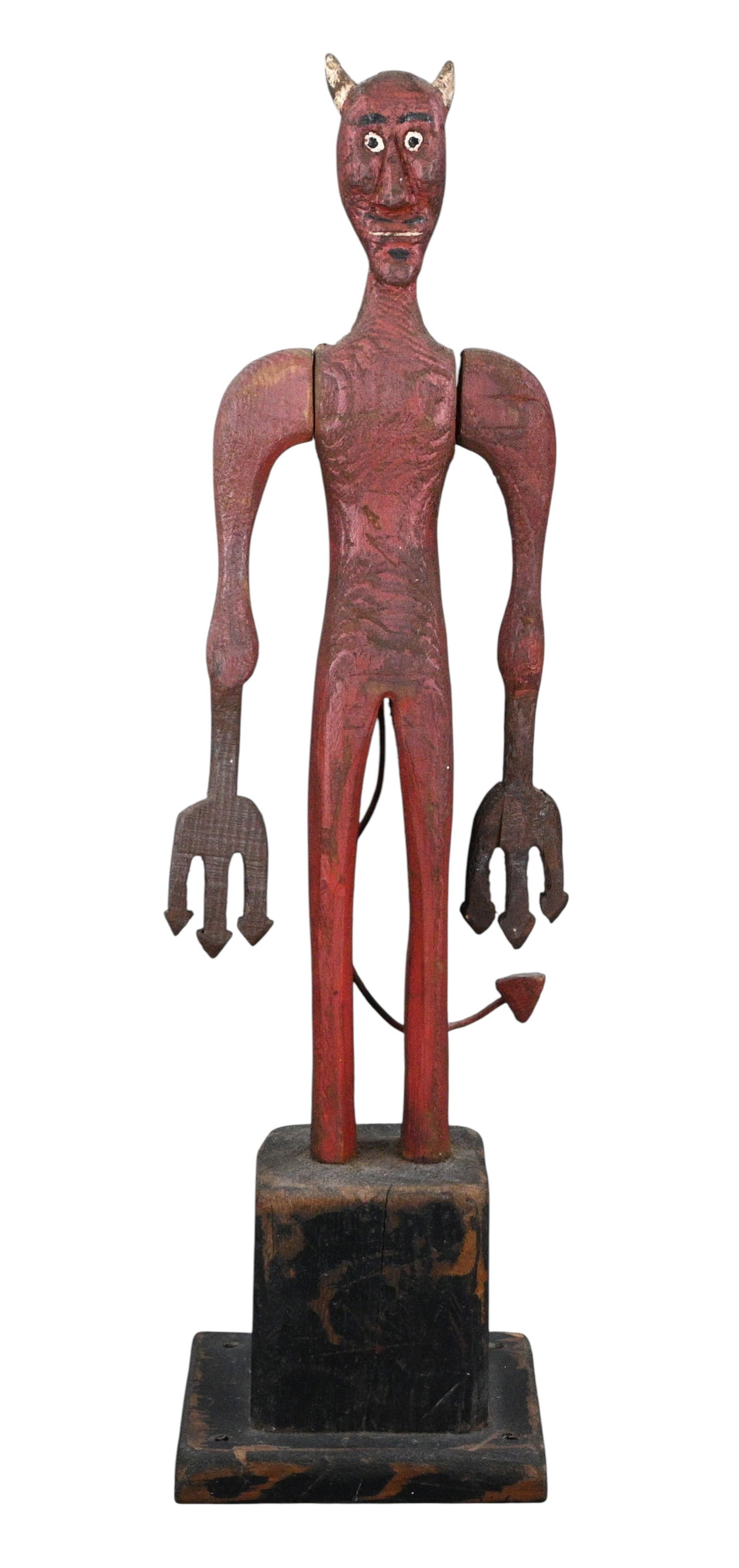 Carved Red Devil Folk Figure with Articulated Arms: Carved Red Devil Folk Figure with Articulated Arms. Carved and painted wooden folk figure depicting a horned devil with elongated limbs and expressive features, standing on a stepped base. Retains ori