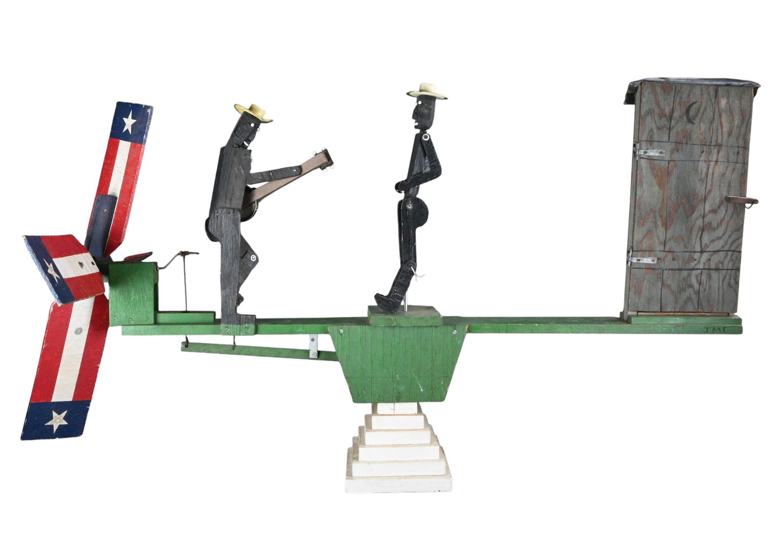 Joe McFall. "Remember Old Jim" Whirligig: Joe McFall. "Remember Old Jim" Whirligig.Circa 1987. Signed. Mixed media. Dancing figures with an outhouse door that opens to reveal a nude man. Good condition. Erotic man is missing part of