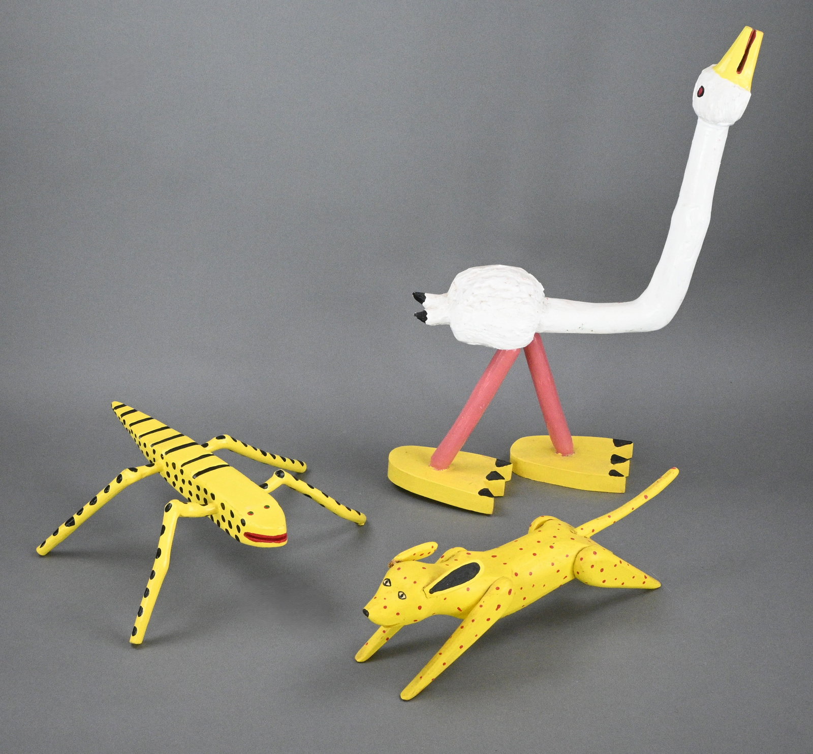 Bill Barker and Roy Minshew. Three Carvings: Bill Barker and Roy Minshew. Three Carvings.Signed and Dated. Paint on carved wood. White Goose - Bill Barker - 2002 Yellow Bug - Bill Barker - 2001 Yellow Dog - Roy Minshew - 1990. Good