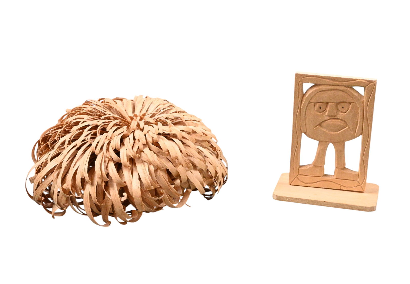 Reverend Herman Hayes. Pair of Carvings: Reverend Herman Hayes. (1923-2012)Pair of Carvings.1996. Signed and Dated. Carved wood. The figural piece is signed and dated. The wooden chrysanthemum is not signed. Excellent condition. 