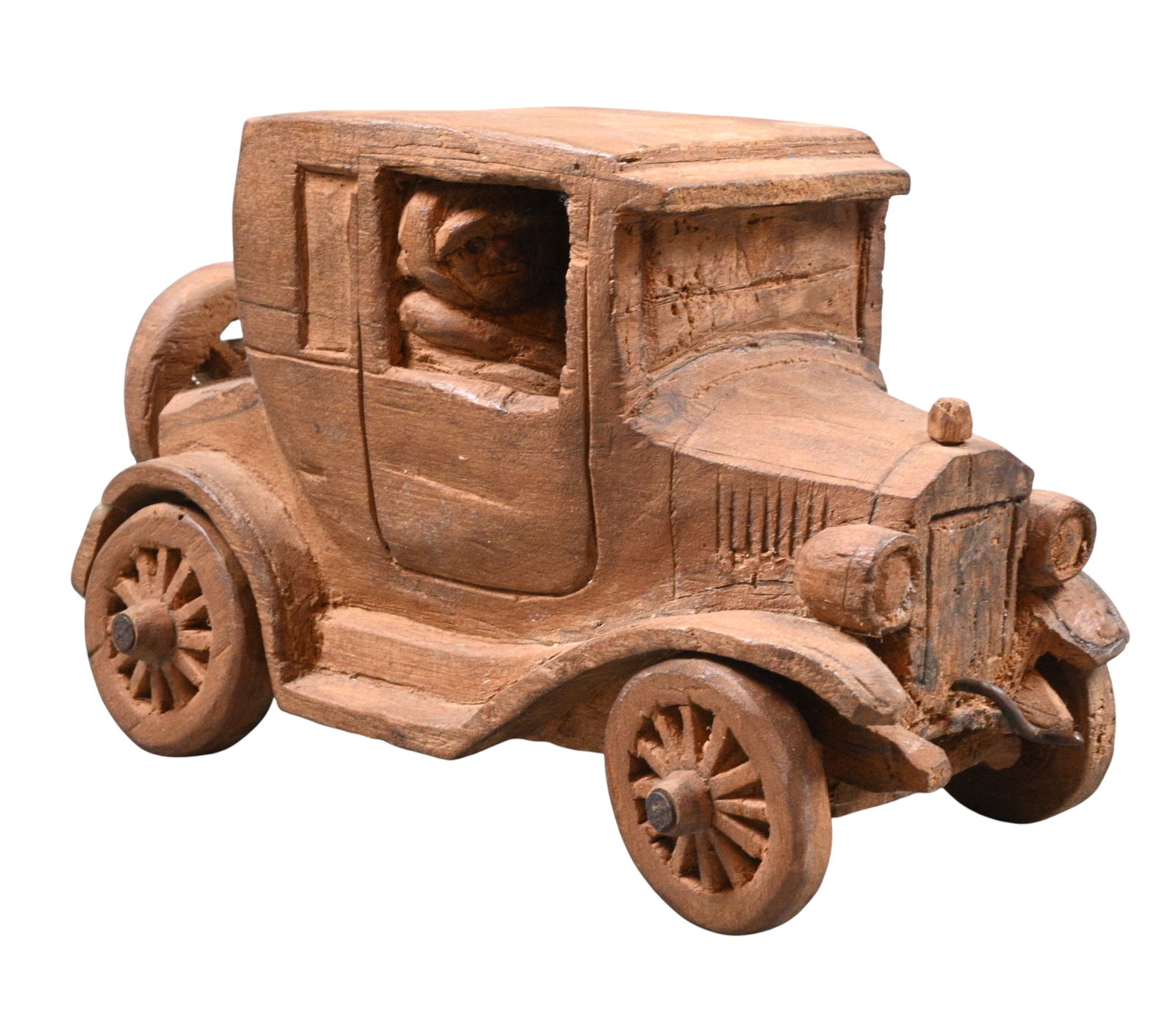 Detailed Wood Carved Touring Car: Detailed Wood Carved Touring Car. Wood carving. Very detailed and an amazing piece. Excellent condition. Size: 4" H x 6.75" W x 3" D. Provenance: Larry Hackley Collection. Est. $100 - $200. 