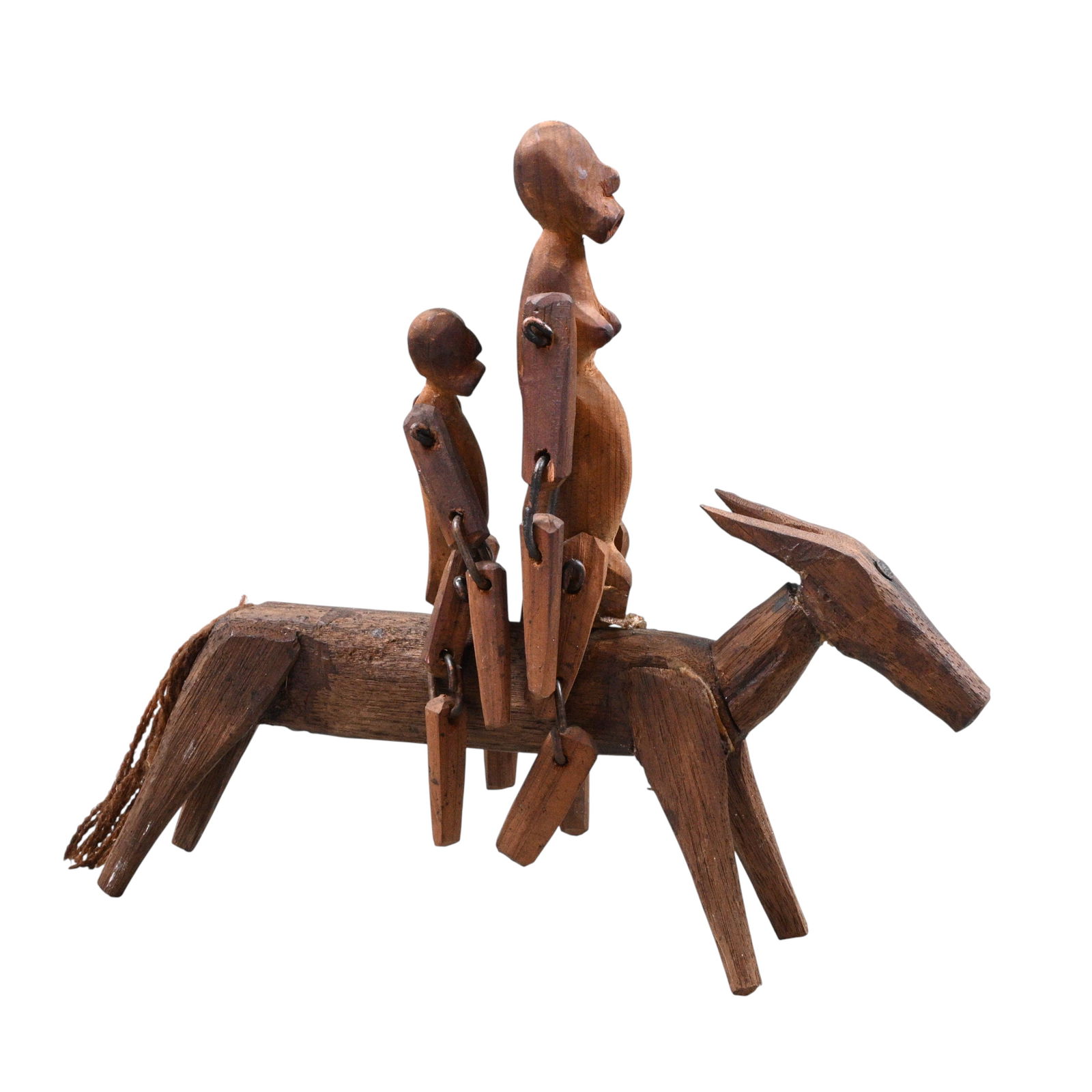 Henry York. Couple Riding on Horse: Henry York. (1913-1995)Couple Riding on Horse.Not Signed. Carved cedar wood with jointed limbs. Excellent condition. Size: 8" H x 8.5" W x 2" W. Provenance: Larry Hackley Collection. Est.