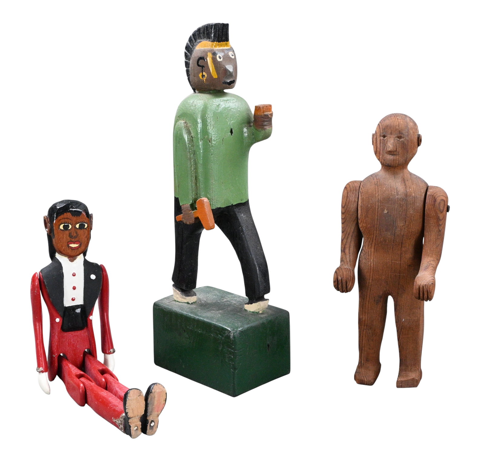 Wood Carved Folk Art Figures: Wood Carved Folk Art Figures. A group of three self taught folk art figures, each carved in wood. The group includes an African American female articulated figure in formal wear, a Native American